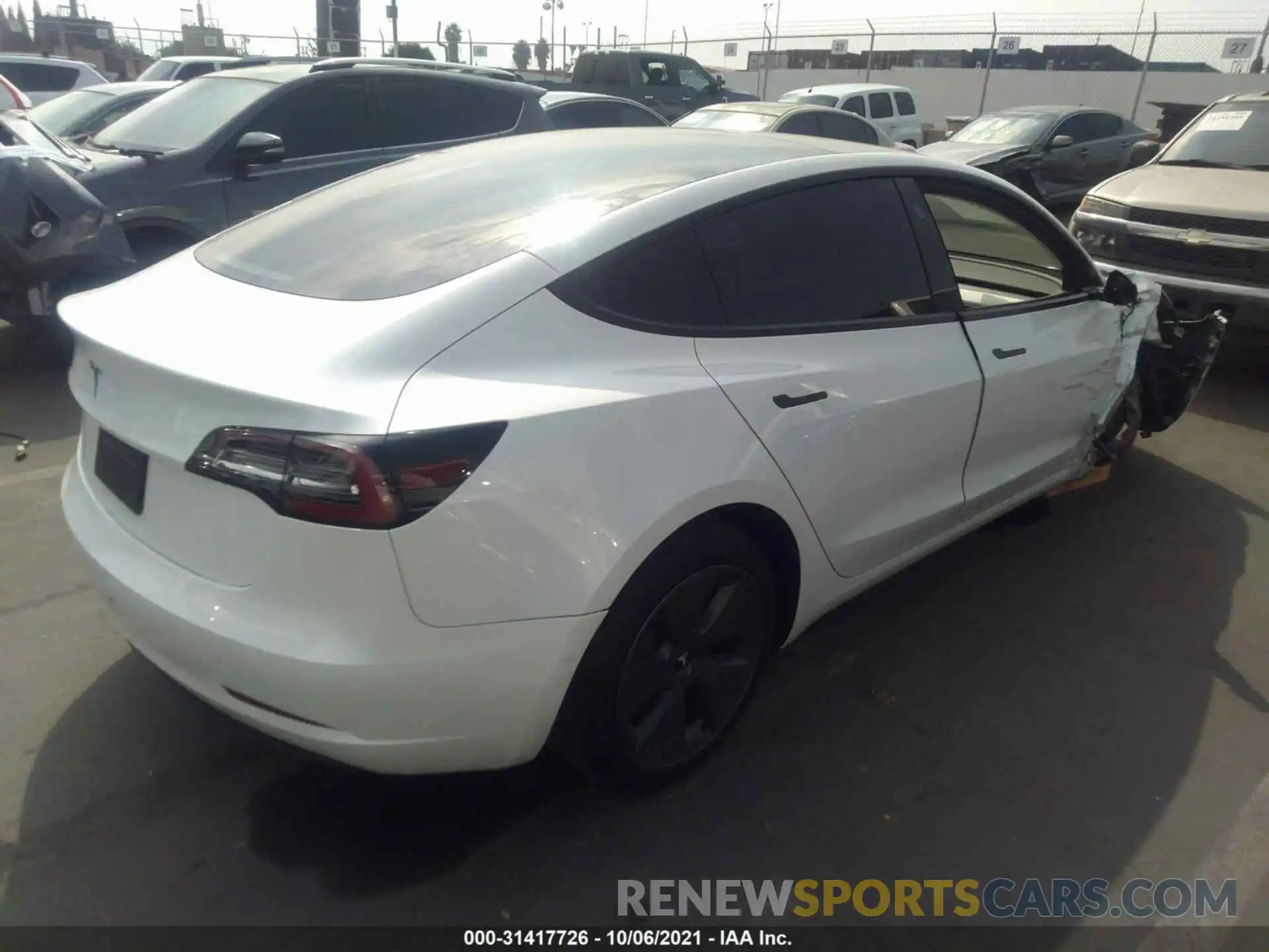 4 Photograph of a damaged car 5YJ3E1EA6MF857405 TESLA MODEL 3 2021