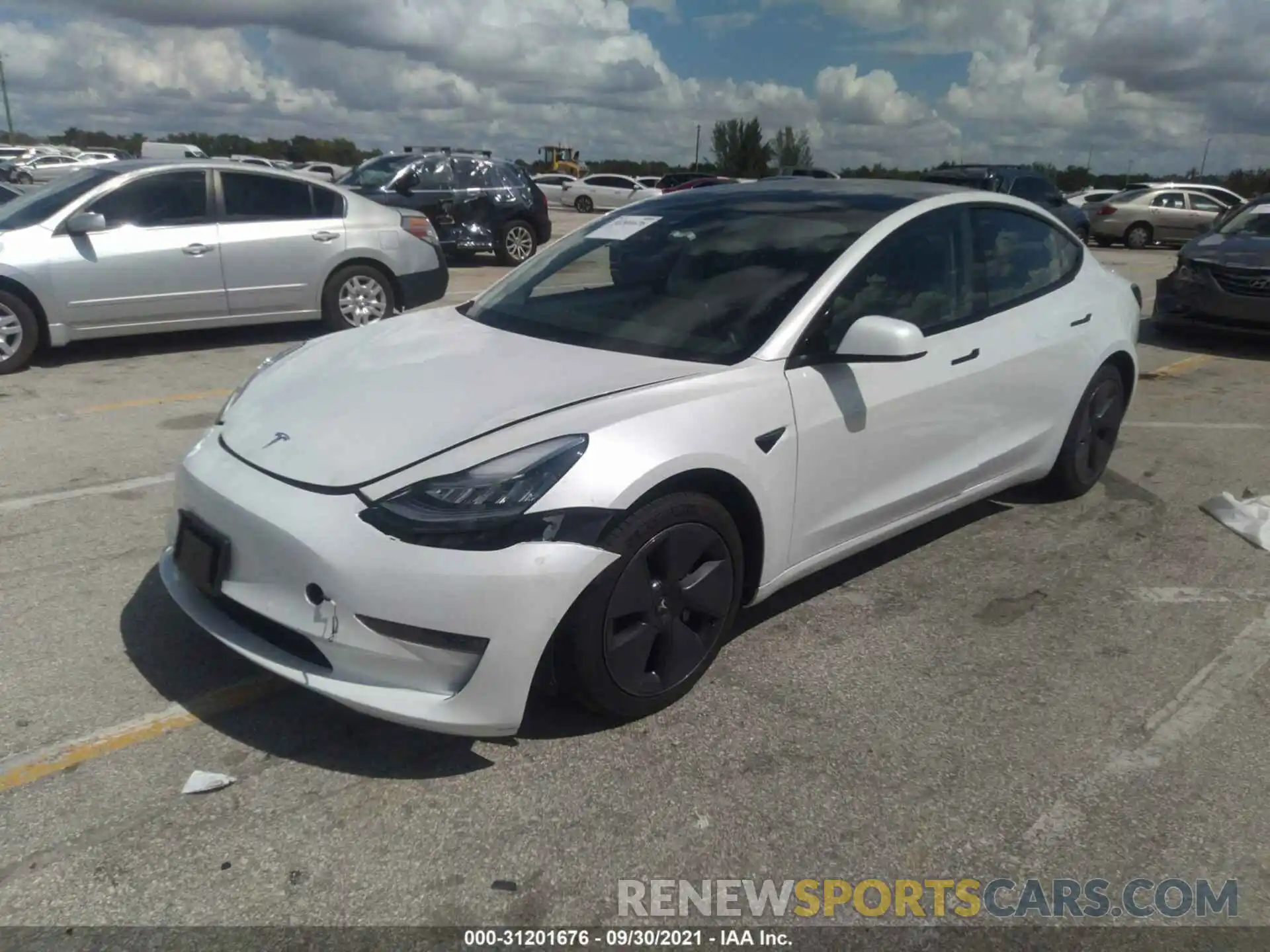 2 Photograph of a damaged car 5YJ3E1EA6MF861275 TESLA MODEL 3 2021