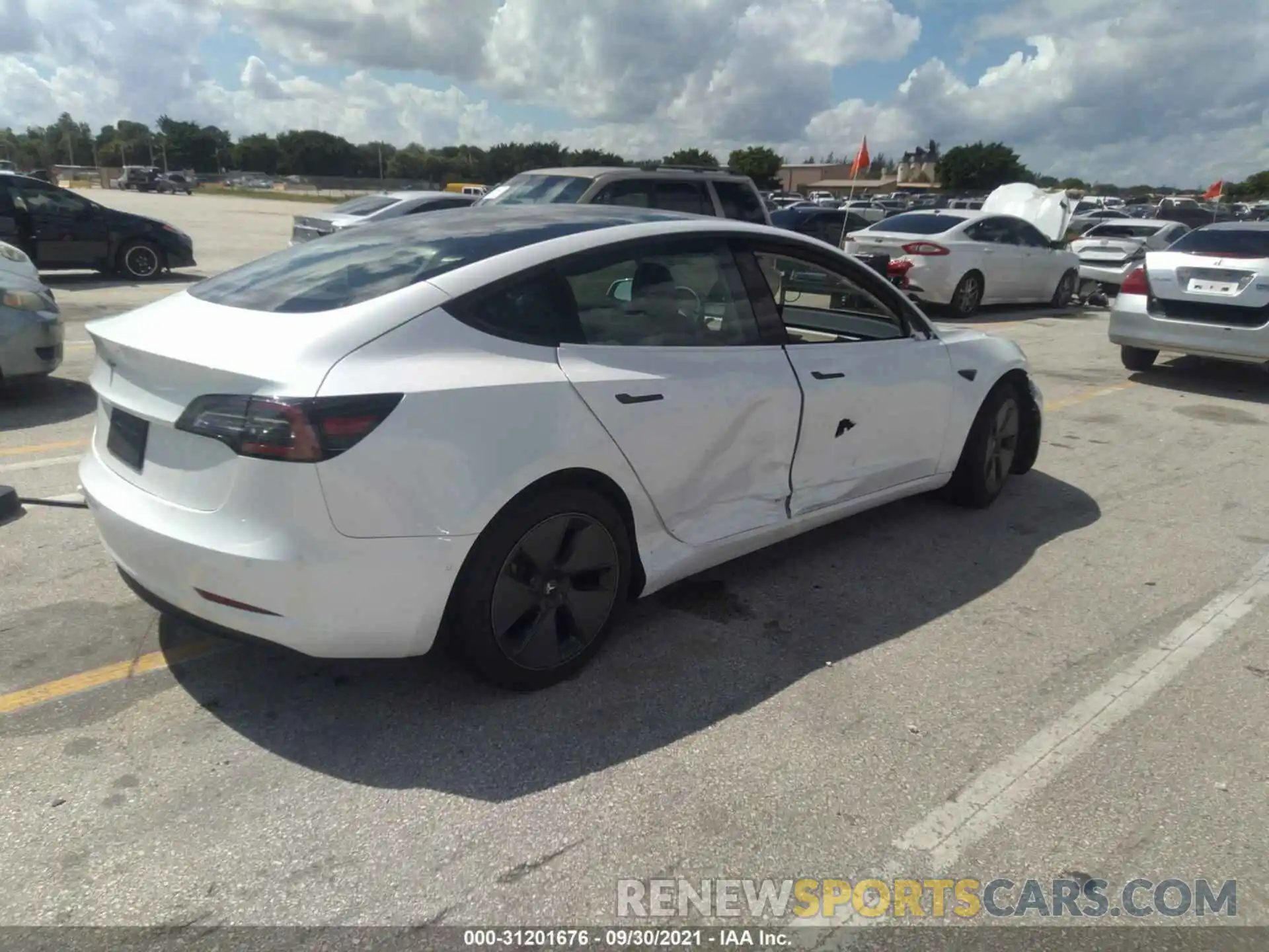 4 Photograph of a damaged car 5YJ3E1EA6MF861275 TESLA MODEL 3 2021