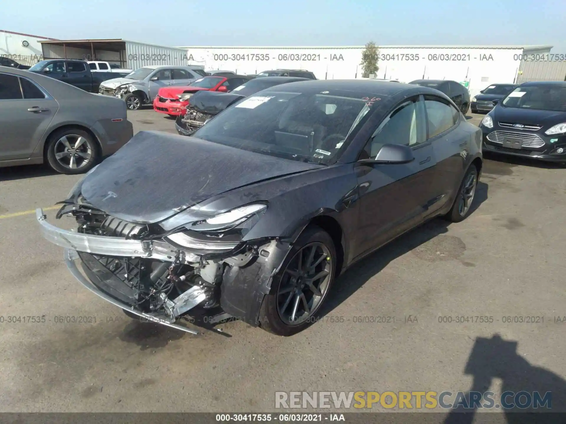 2 Photograph of a damaged car 5YJ3E1EA6MF873135 TESLA MODEL 3 2021