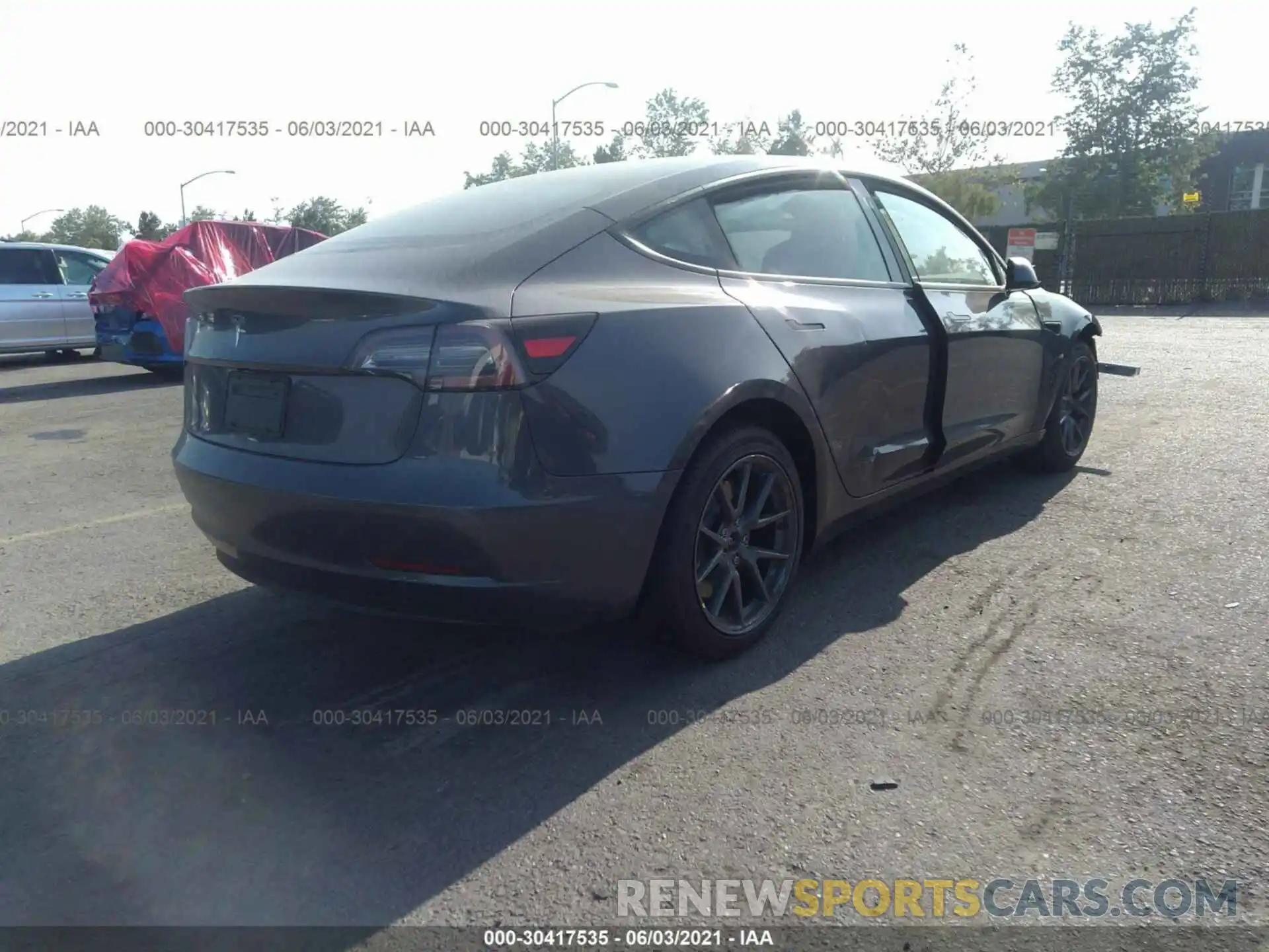 4 Photograph of a damaged car 5YJ3E1EA6MF873135 TESLA MODEL 3 2021