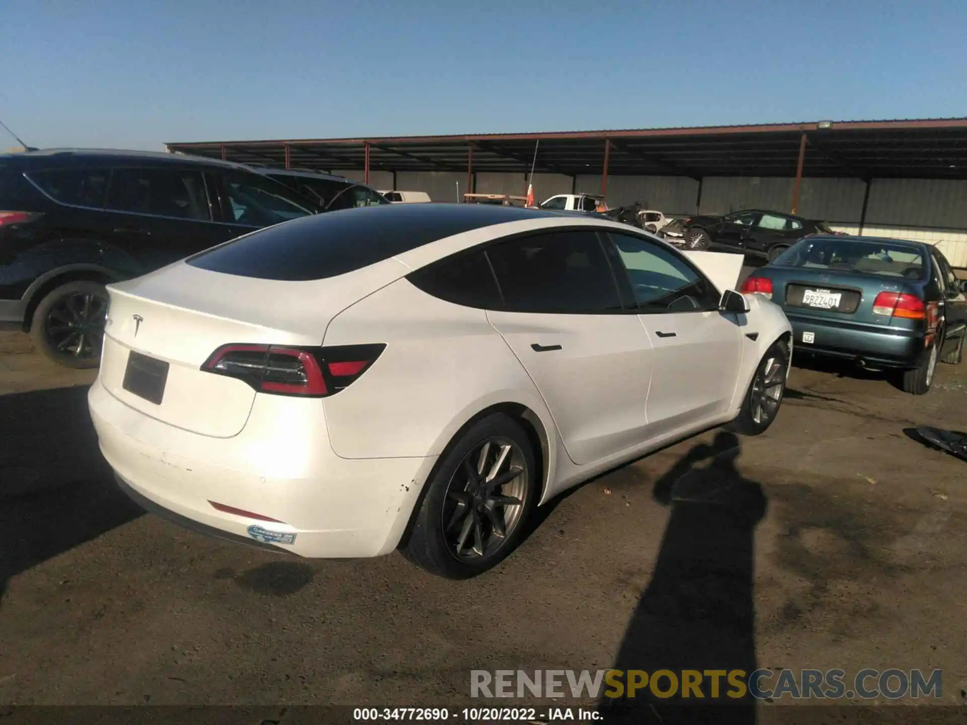 4 Фотография поврежденного автомобиля 5YJ3E1EA6MF874012 TESLA MODEL 3 2021