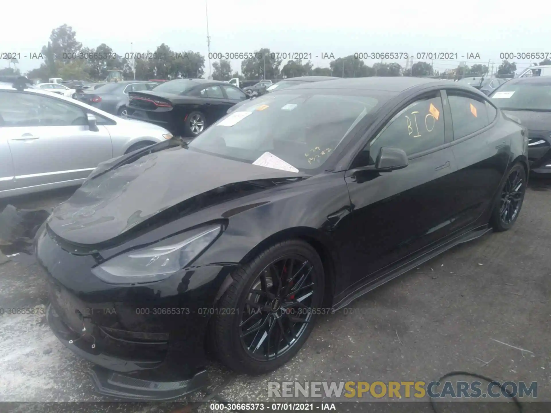 2 Photograph of a damaged car 5YJ3E1EA6MF875502 TESLA MODEL 3 2021