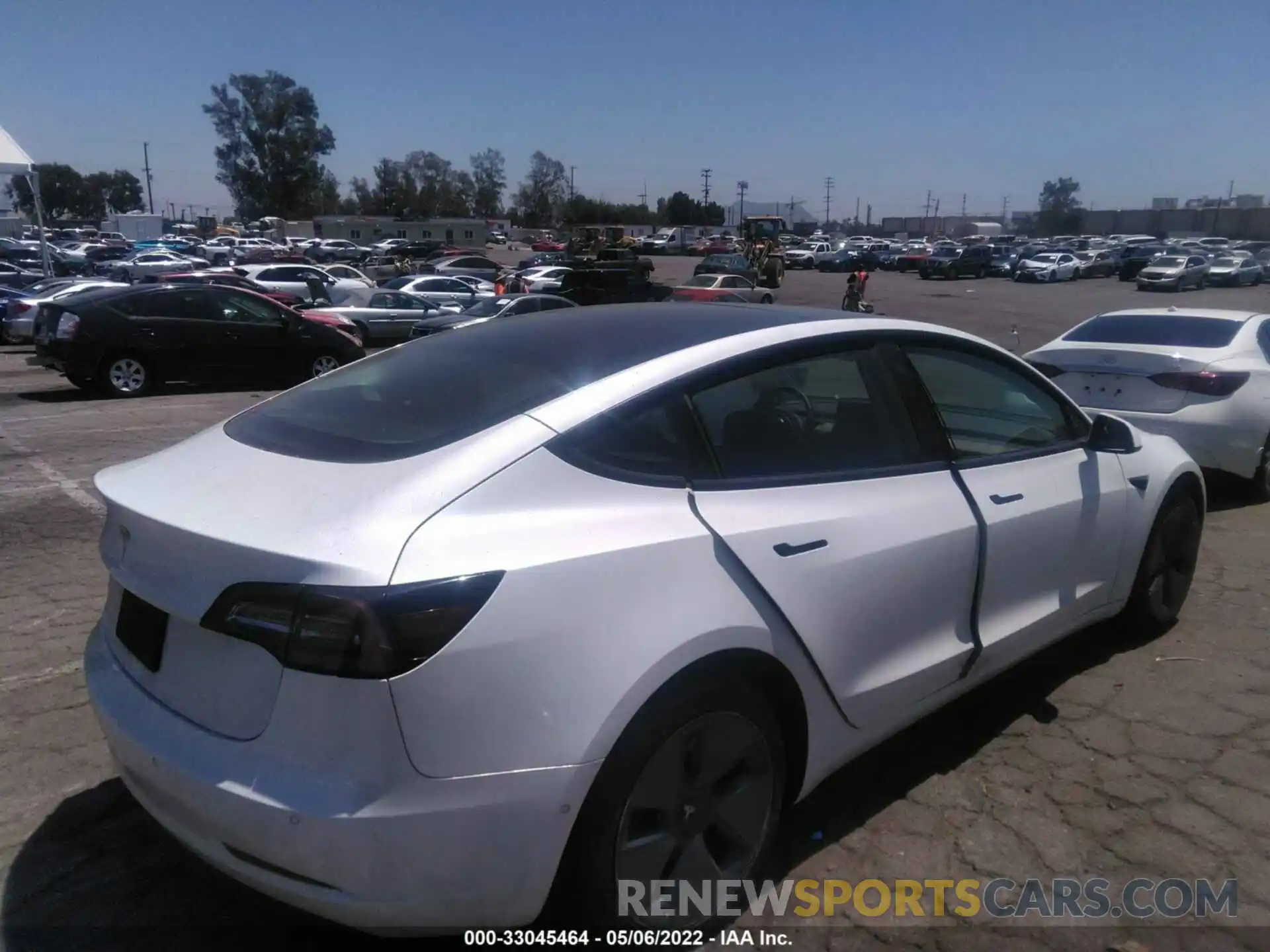 4 Photograph of a damaged car 5YJ3E1EA6MF876987 TESLA MODEL 3 2021