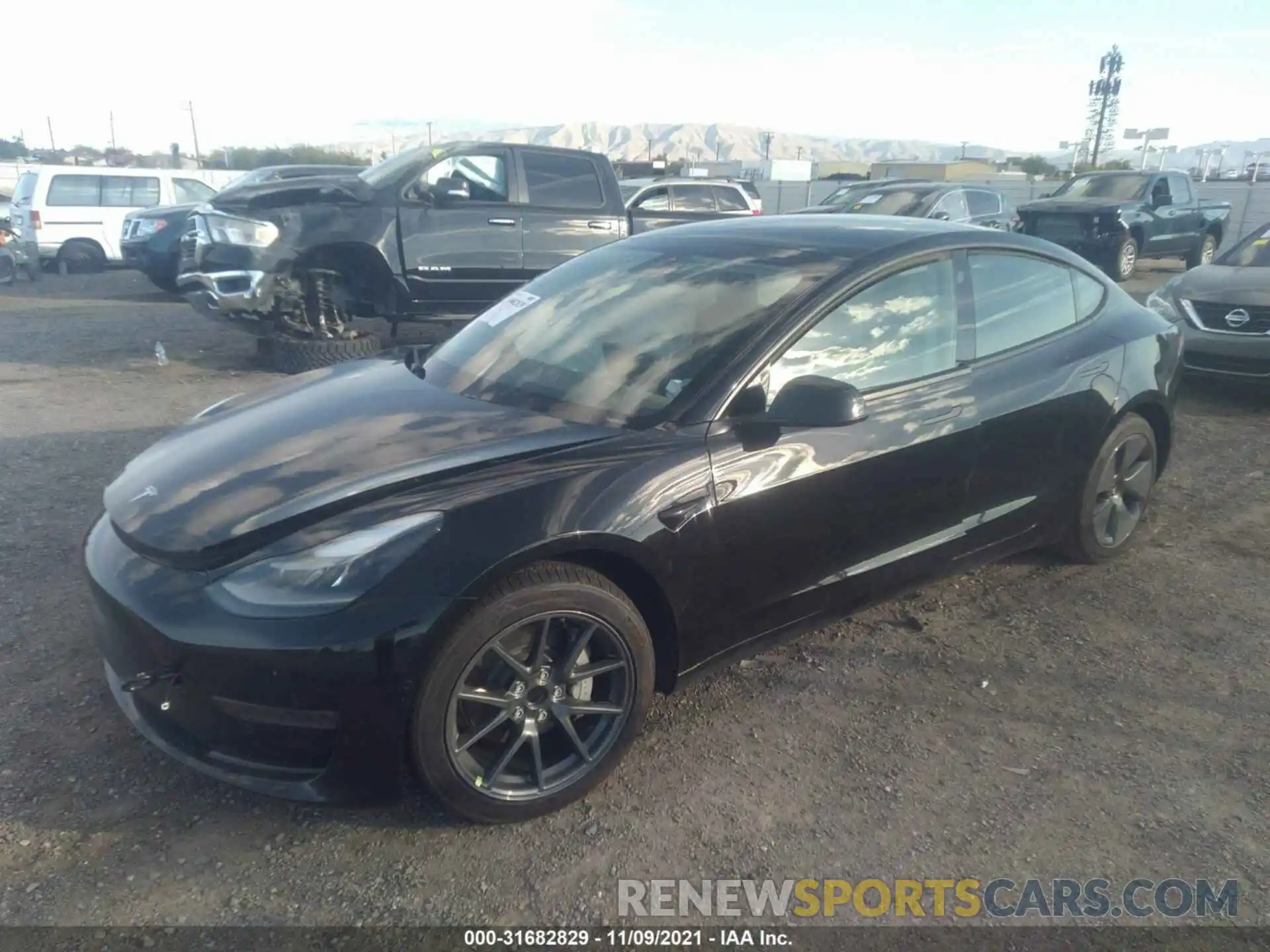 2 Photograph of a damaged car 5YJ3E1EA6MF930286 TESLA MODEL 3 2021