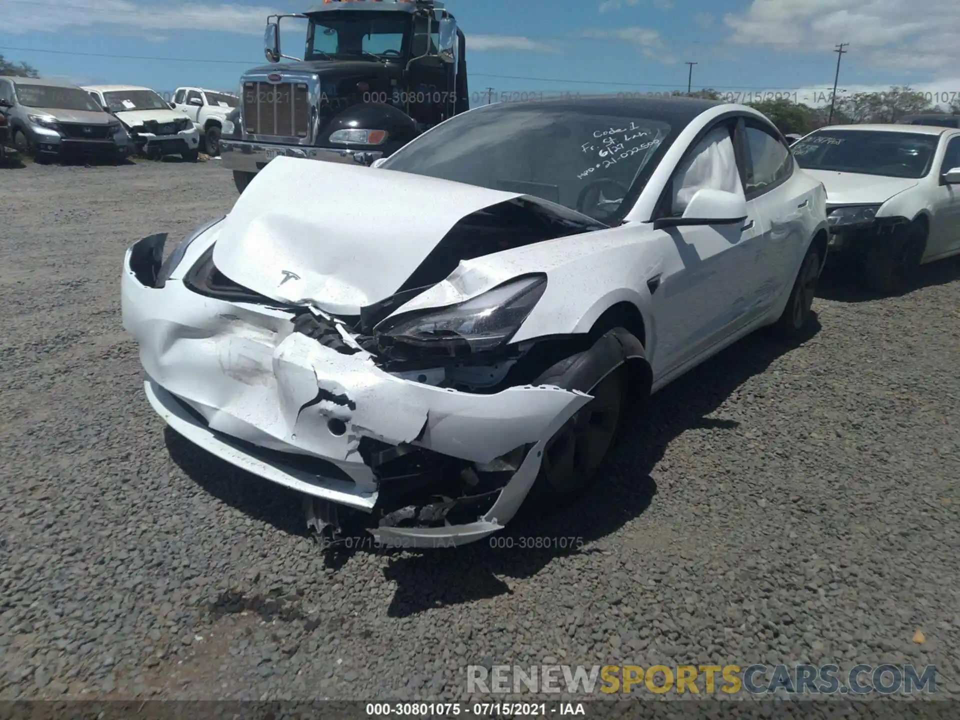 2 Photograph of a damaged car 5YJ3E1EA6MF973204 TESLA MODEL 3 2021