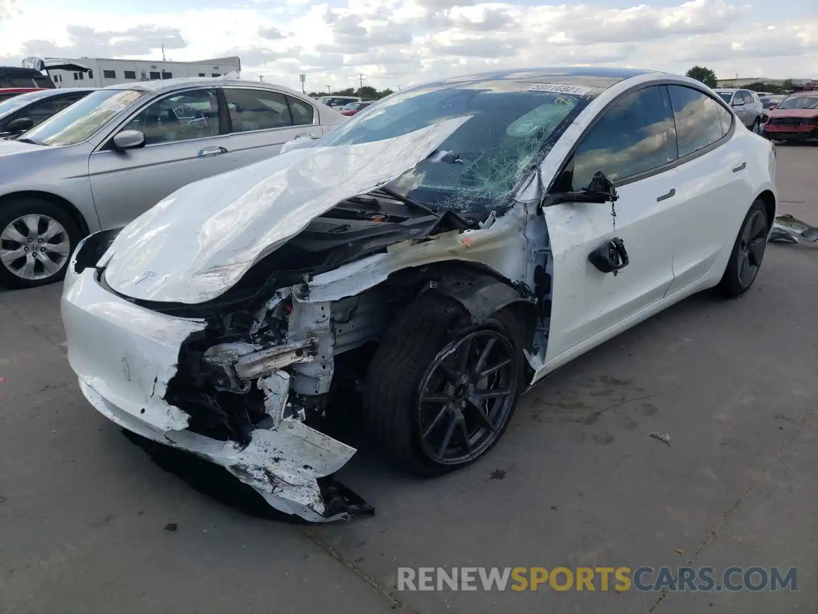 2 Photograph of a damaged car 5YJ3E1EA6MF982954 TESLA MODEL 3 2021