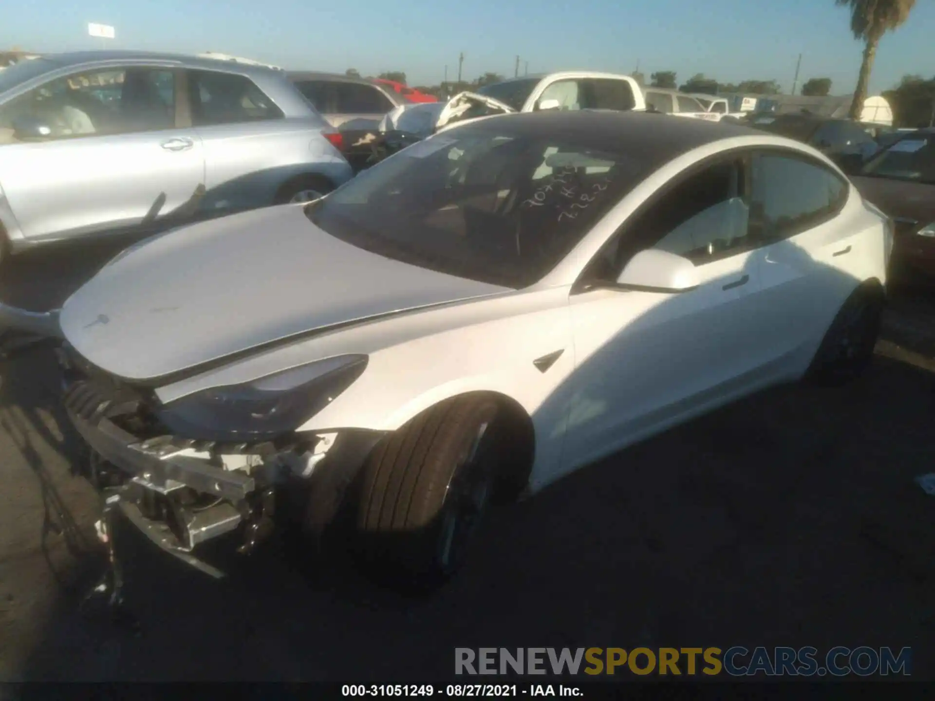 2 Photograph of a damaged car 5YJ3E1EA6MF997891 TESLA MODEL 3 2021