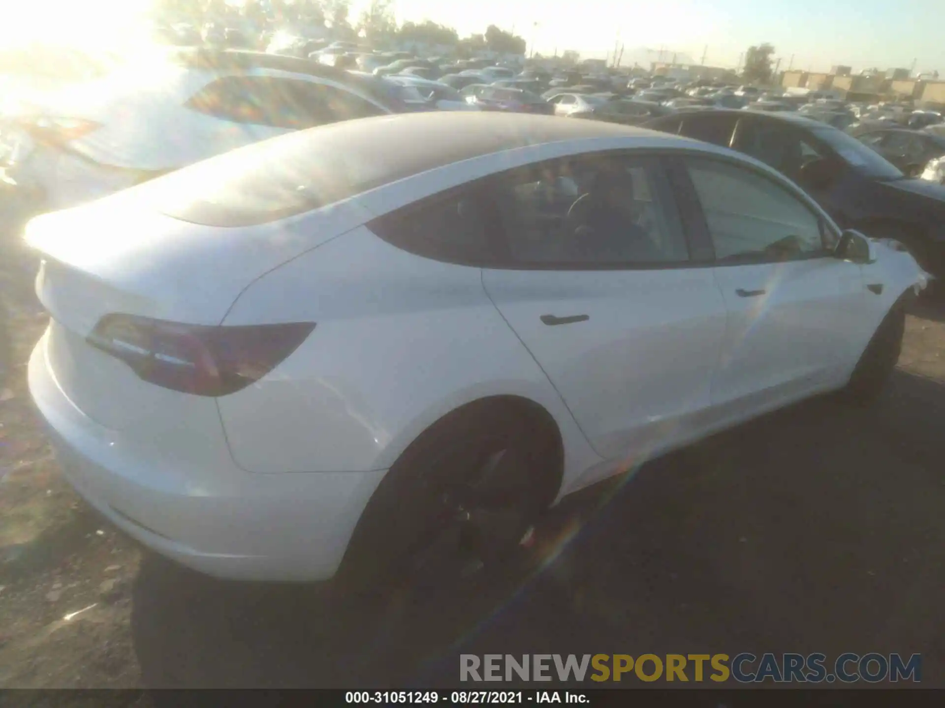 4 Photograph of a damaged car 5YJ3E1EA6MF997891 TESLA MODEL 3 2021