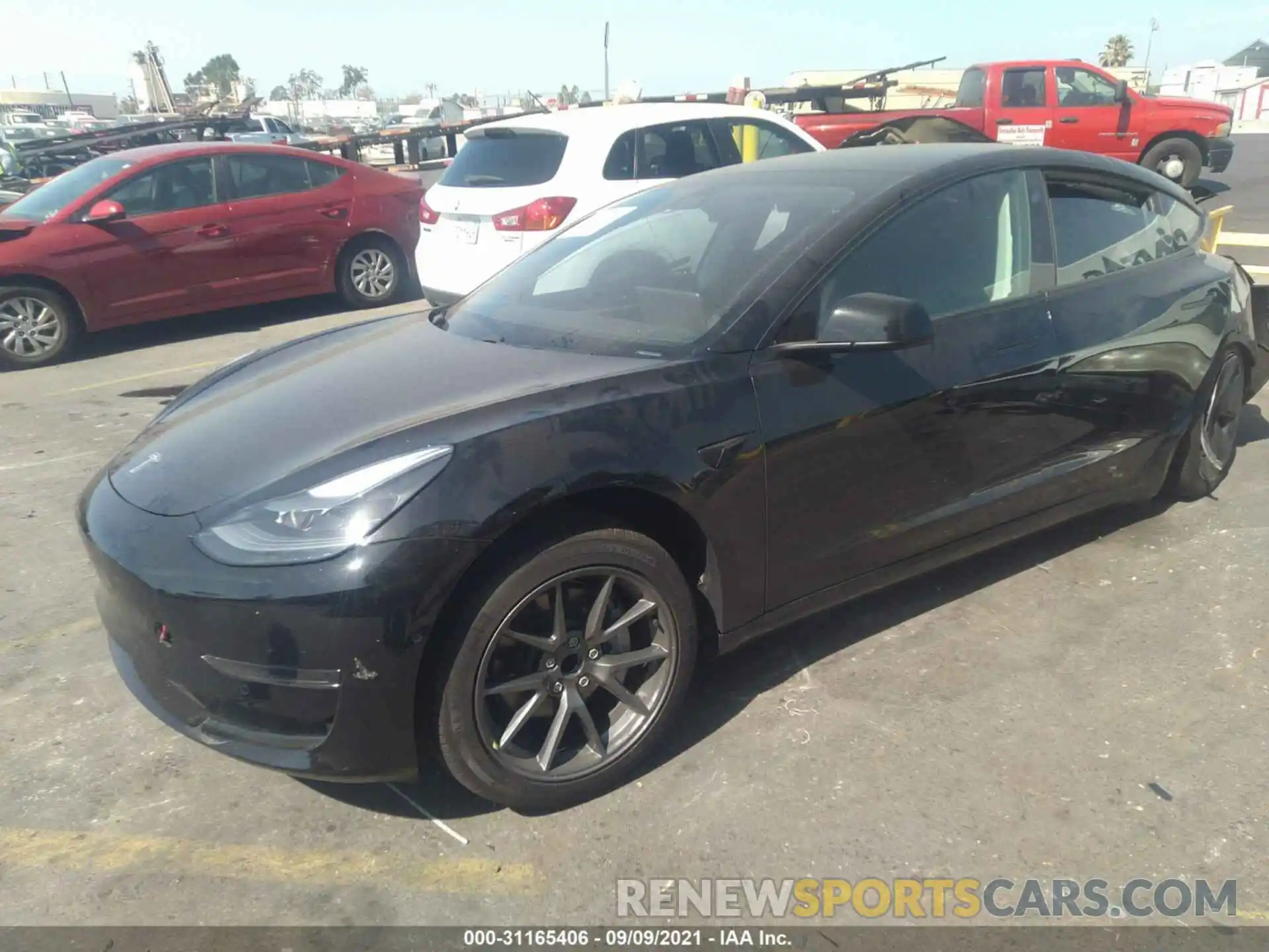 2 Photograph of a damaged car 5YJ3E1EA6MF998216 TESLA MODEL 3 2021