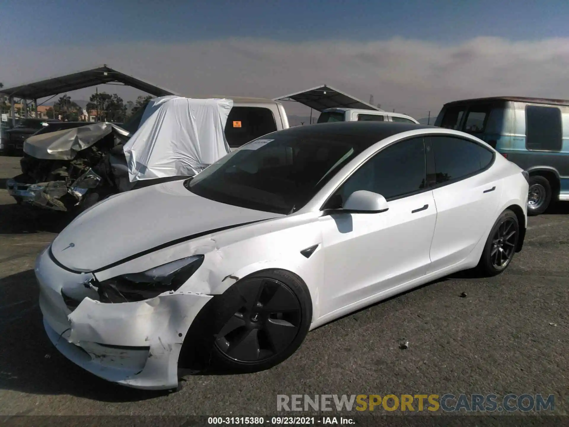 2 Photograph of a damaged car 5YJ3E1EA7MF005497 TESLA MODEL 3 2021