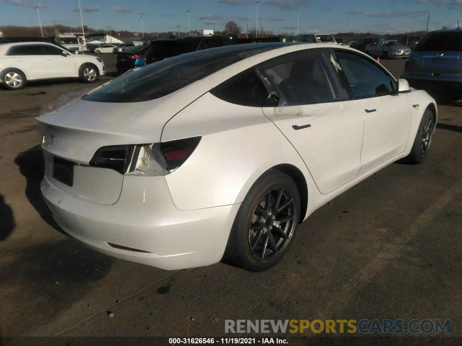 4 Photograph of a damaged car 5YJ3E1EA7MF017276 TESLA MODEL 3 2021