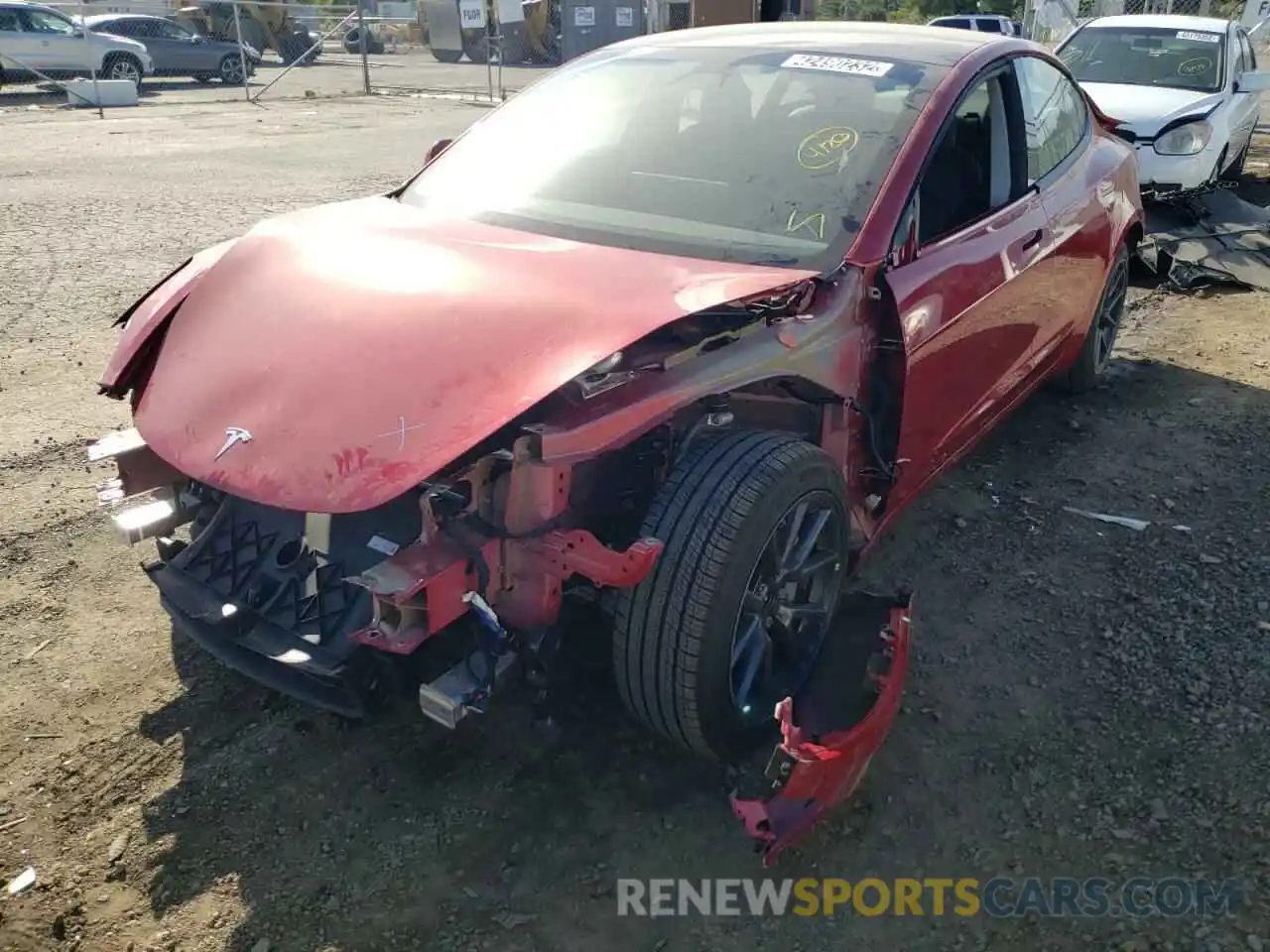 2 Photograph of a damaged car 5YJ3E1EA7MF027256 TESLA MODEL 3 2021