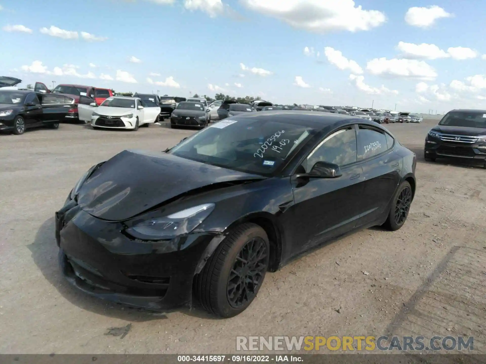 2 Photograph of a damaged car 5YJ3E1EA7MF046048 TESLA MODEL 3 2021