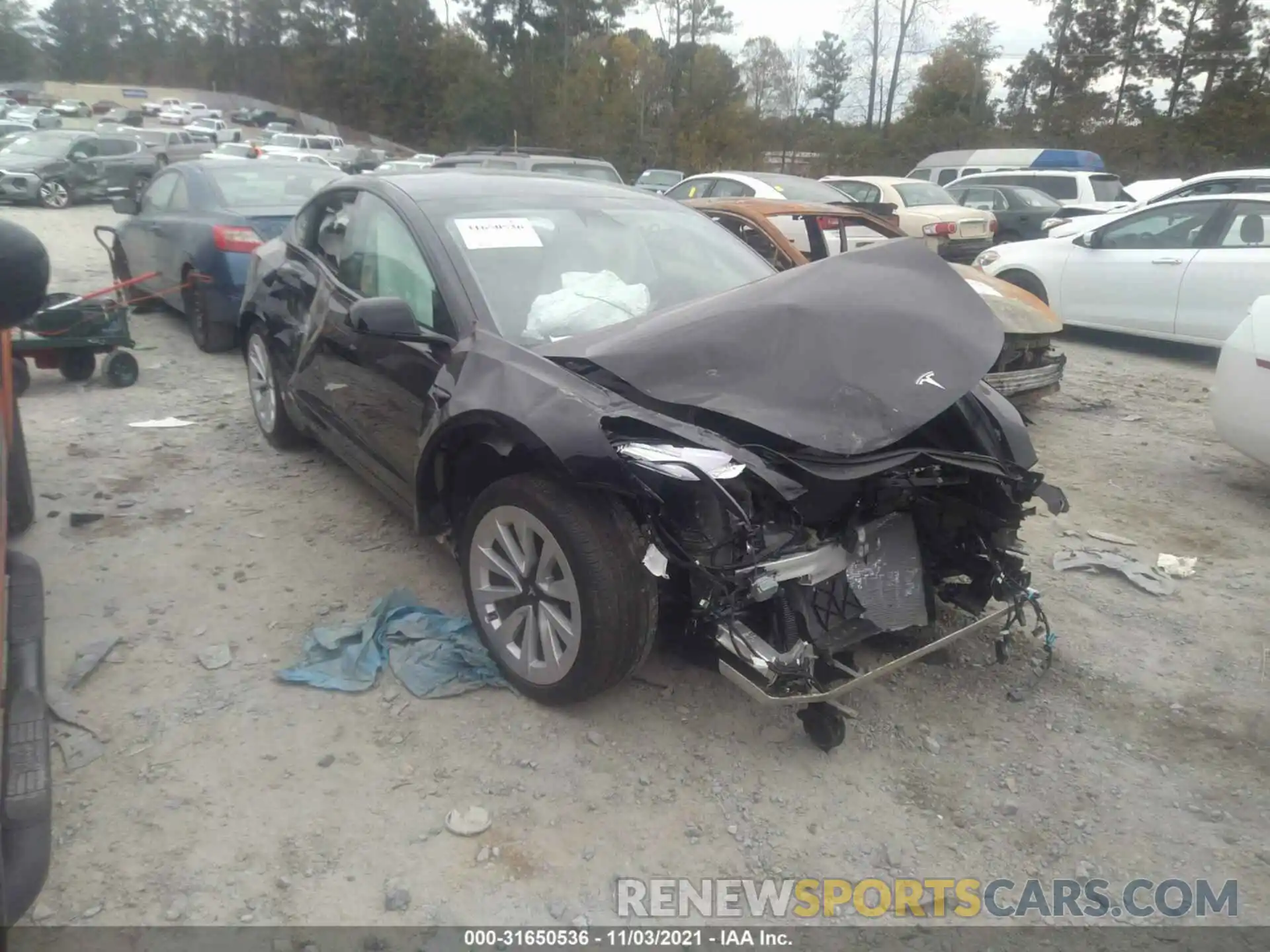 1 Photograph of a damaged car 5YJ3E1EA7MF046745 TESLA MODEL 3 2021