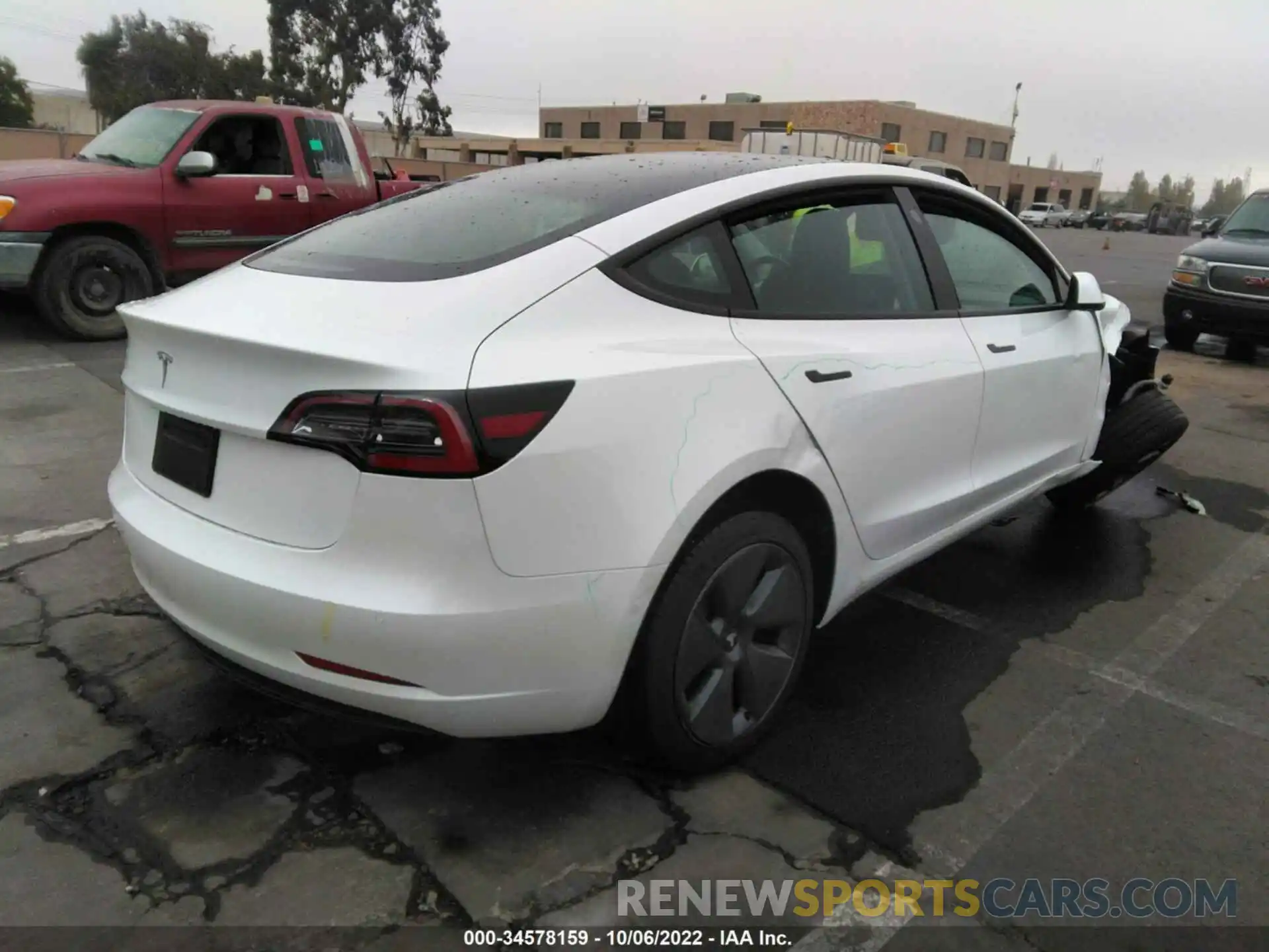 4 Photograph of a damaged car 5YJ3E1EA7MF051122 TESLA MODEL 3 2021