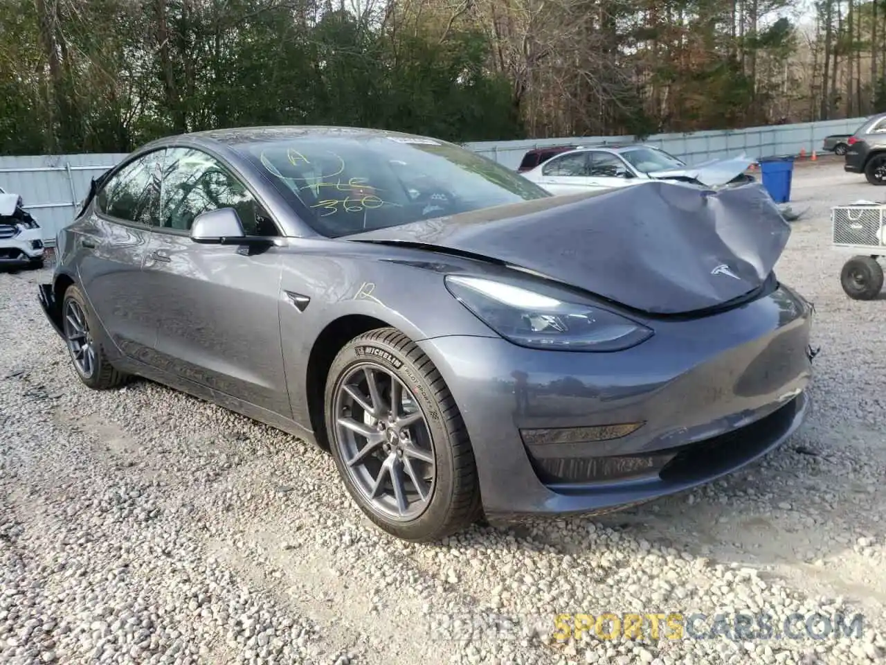 1 Photograph of a damaged car 5YJ3E1EA7MF092852 TESLA MODEL 3 2021