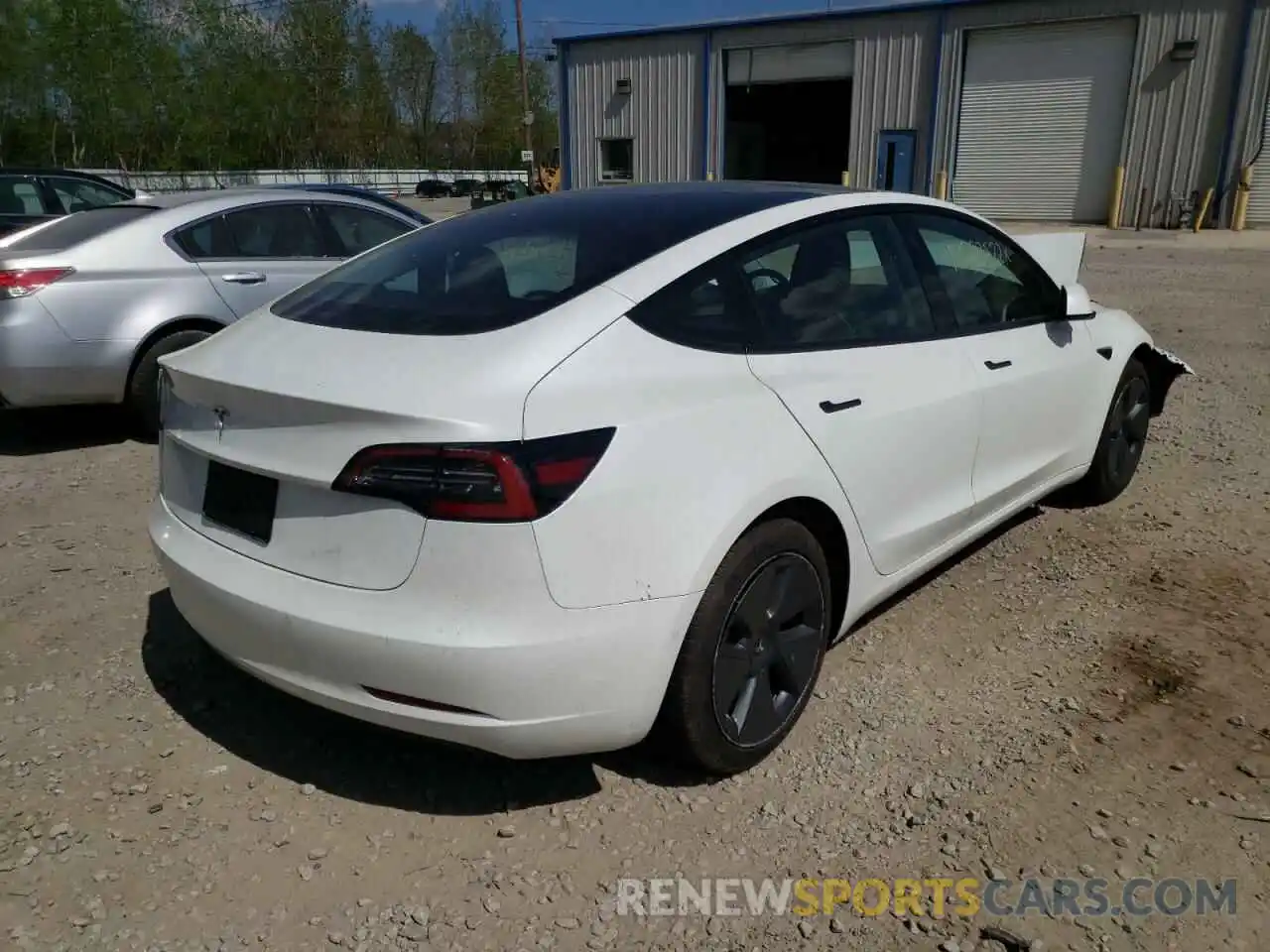 4 Photograph of a damaged car 5YJ3E1EA7MF100285 TESLA MODEL 3 2021