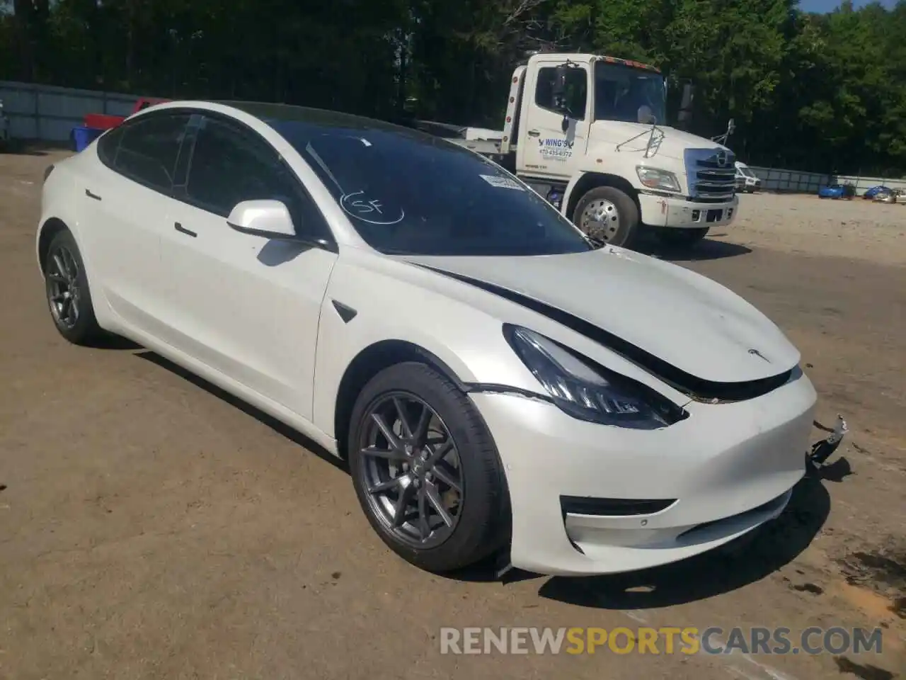 1 Photograph of a damaged car 5YJ3E1EA7MF853699 TESLA MODEL 3 2021