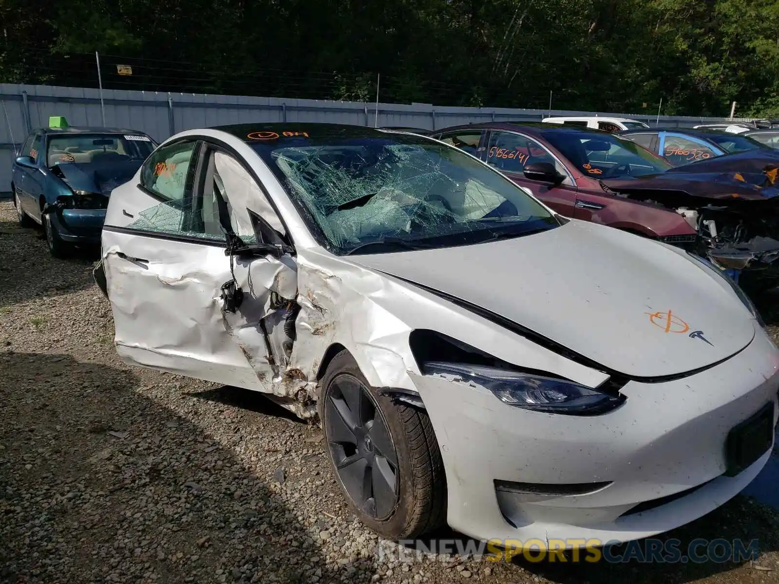 9 Photograph of a damaged car 5YJ3E1EA7MF854710 TESLA MODEL 3 2021