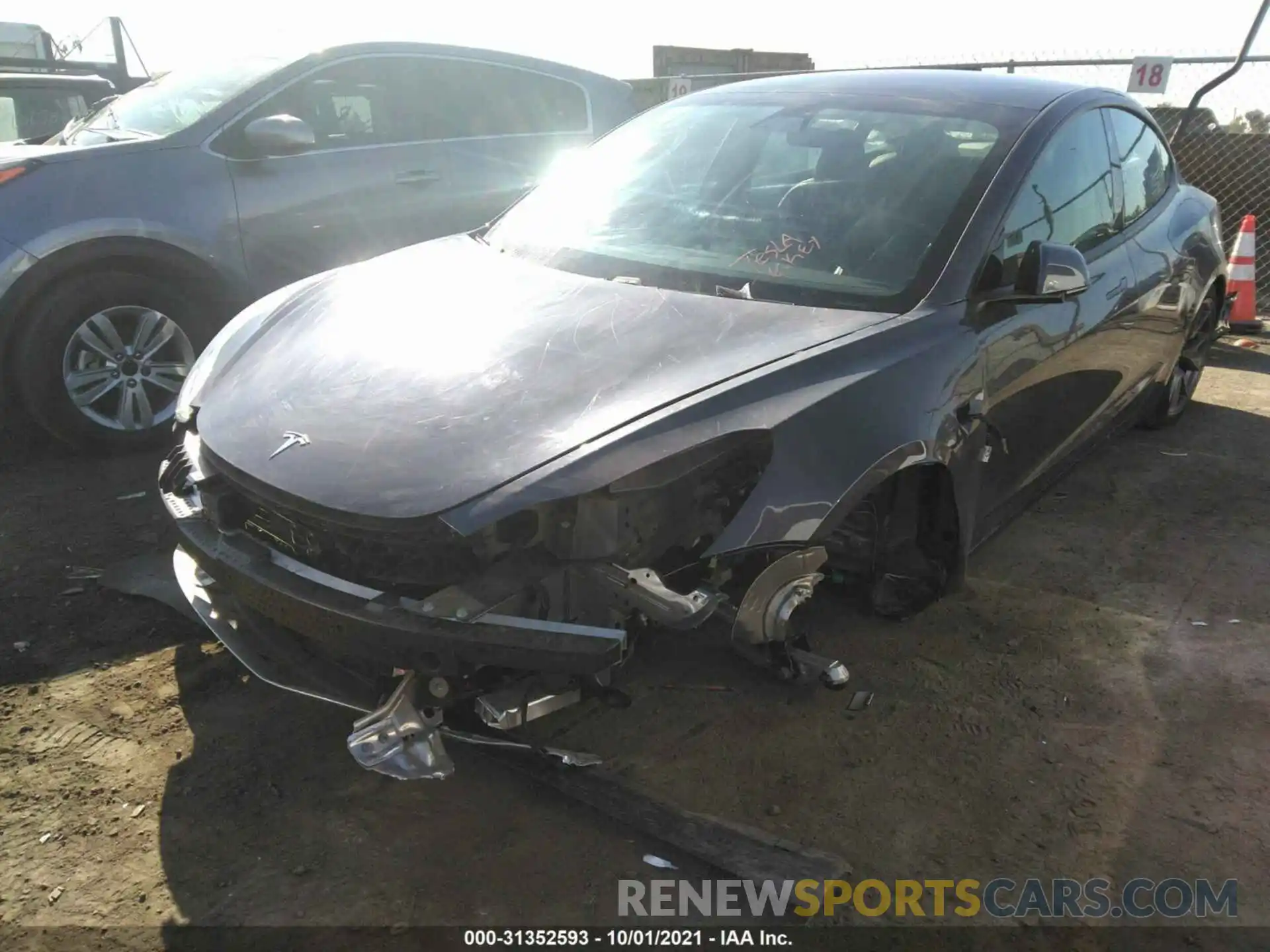 2 Photograph of a damaged car 5YJ3E1EA7MF876013 TESLA MODEL 3 2021