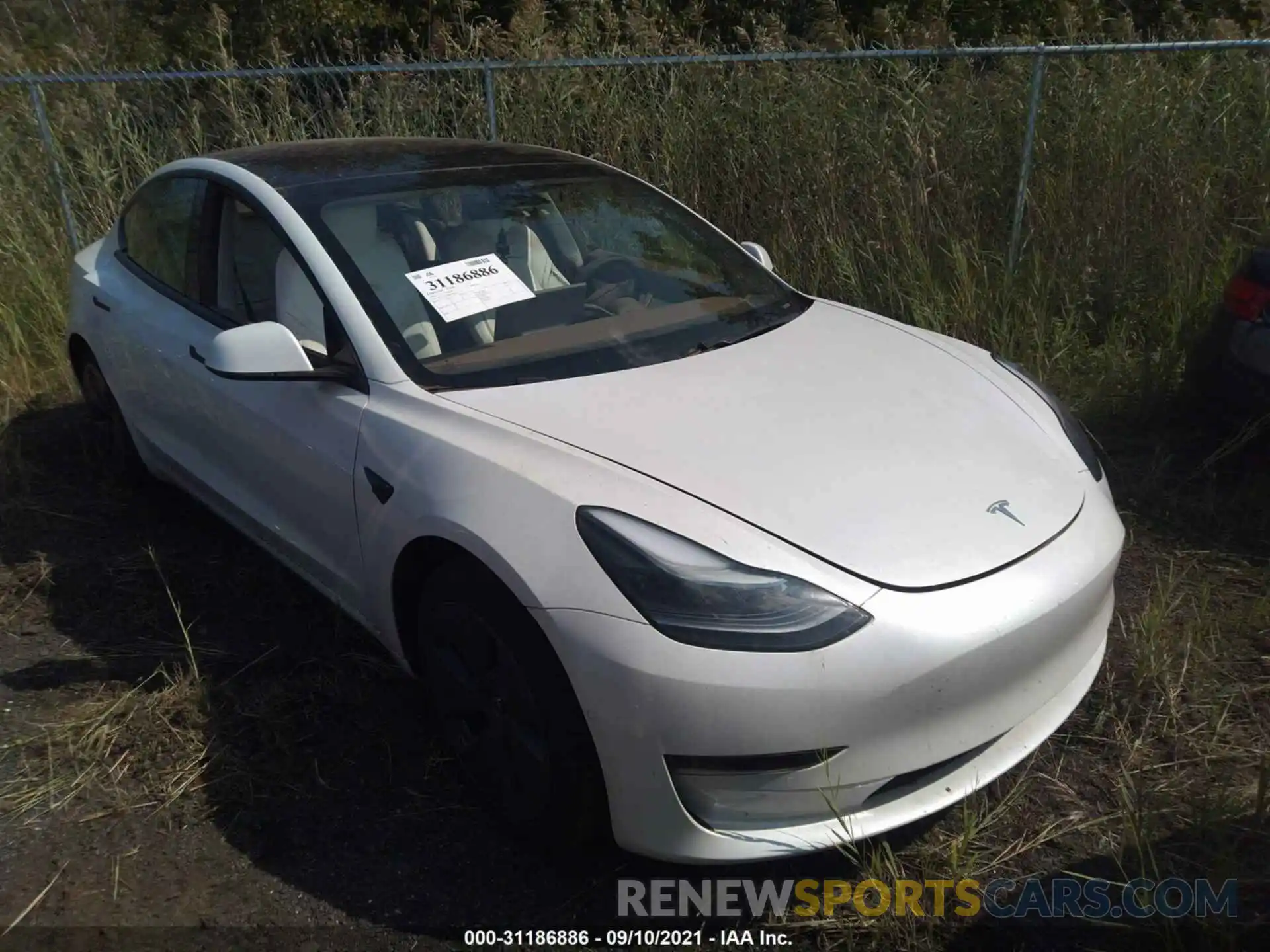 1 Photograph of a damaged car 5YJ3E1EA7MF908605 TESLA MODEL 3 2021