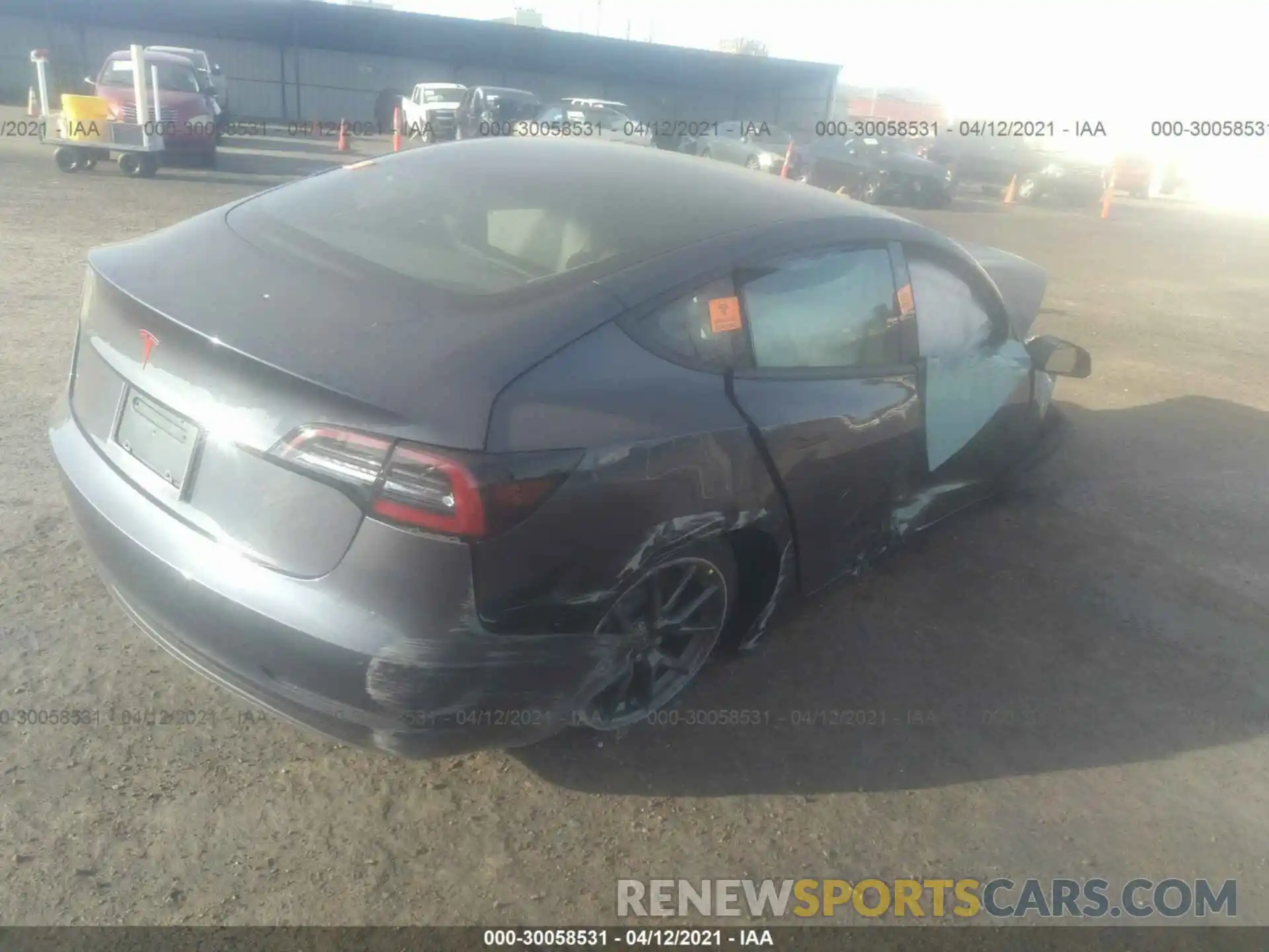 4 Photograph of a damaged car 5YJ3E1EA7MF923072 TESLA MODEL 3 2021