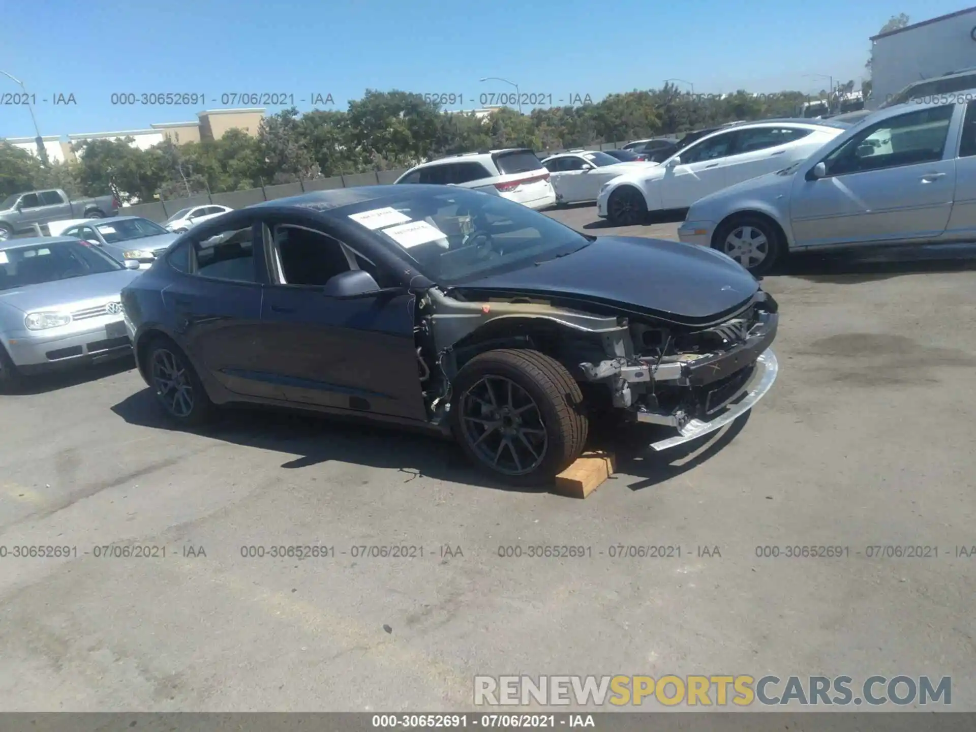 1 Photograph of a damaged car 5YJ3E1EA7MF929583 TESLA MODEL 3 2021