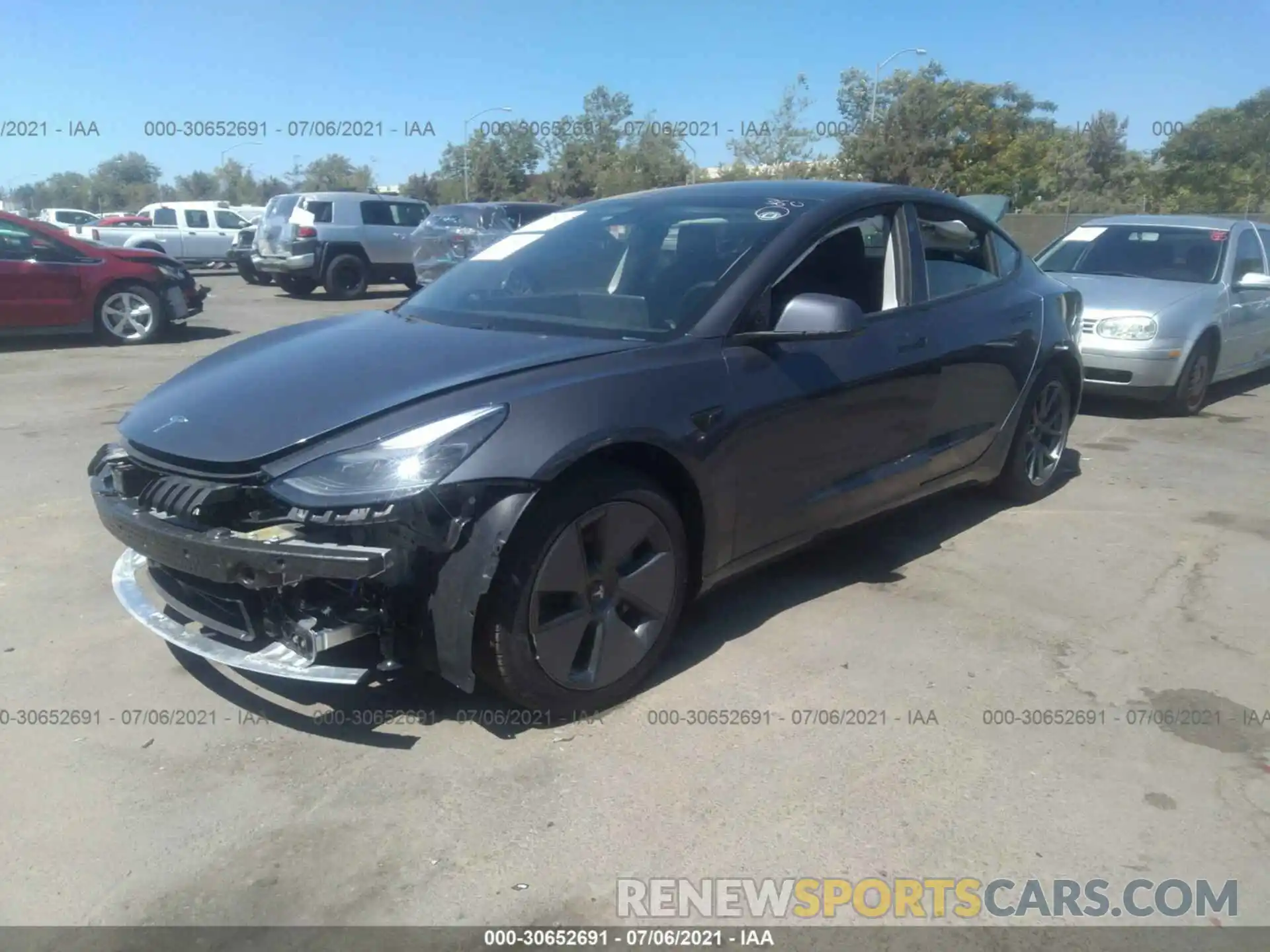 2 Photograph of a damaged car 5YJ3E1EA7MF929583 TESLA MODEL 3 2021