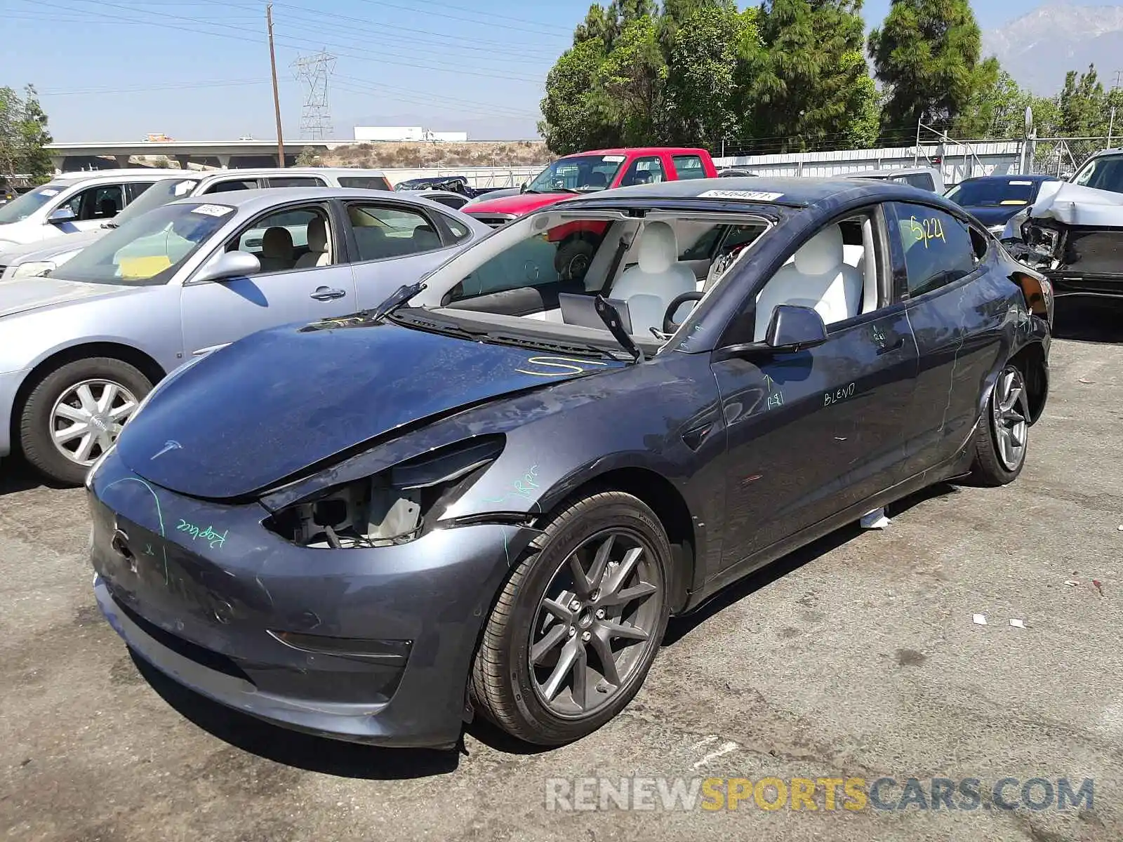 2 Photograph of a damaged car 5YJ3E1EA7MF938641 TESLA MODEL 3 2021