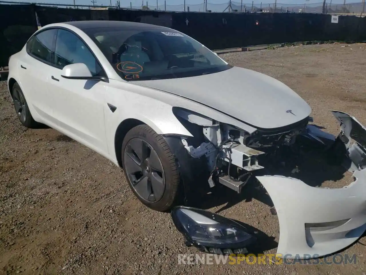 1 Photograph of a damaged car 5YJ3E1EA7MF938798 TESLA MODEL 3 2021