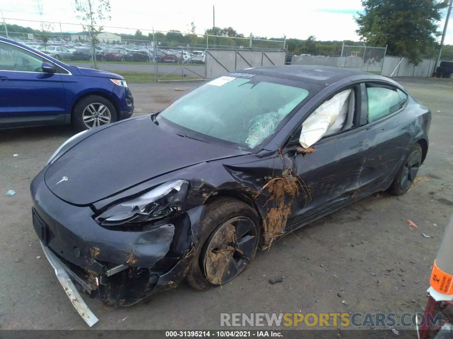 2 Photograph of a damaged car 5YJ3E1EA7MF974040 TESLA MODEL 3 2021