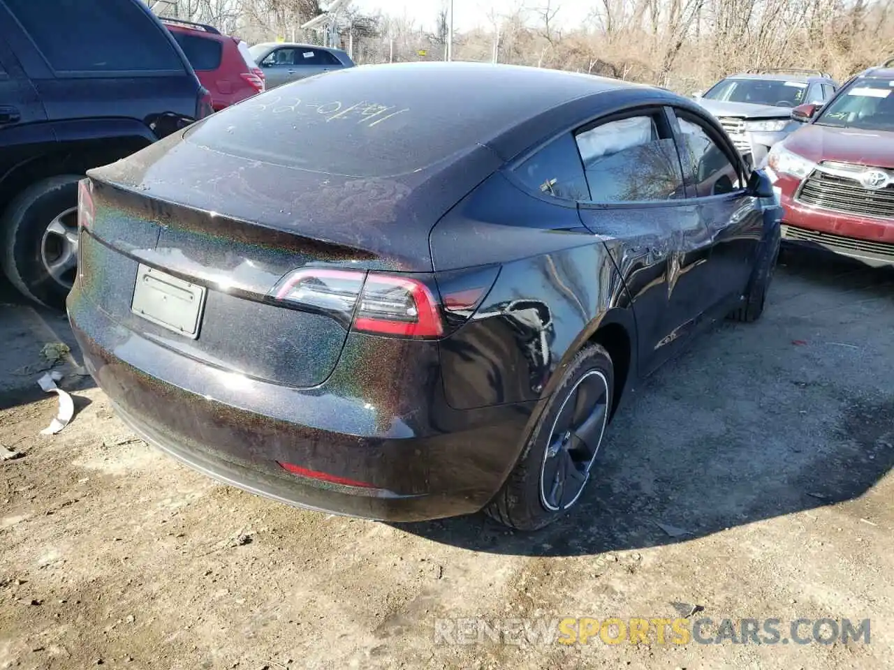 4 Photograph of a damaged car 5YJ3E1EA7MF986401 TESLA MODEL 3 2021