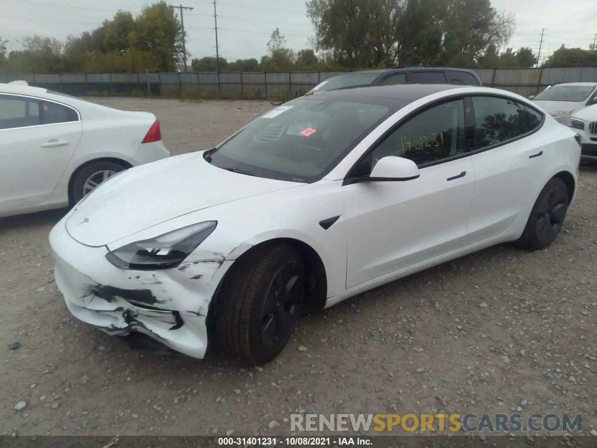 2 Photograph of a damaged car 5YJ3E1EA7MF989105 TESLA MODEL 3 2021