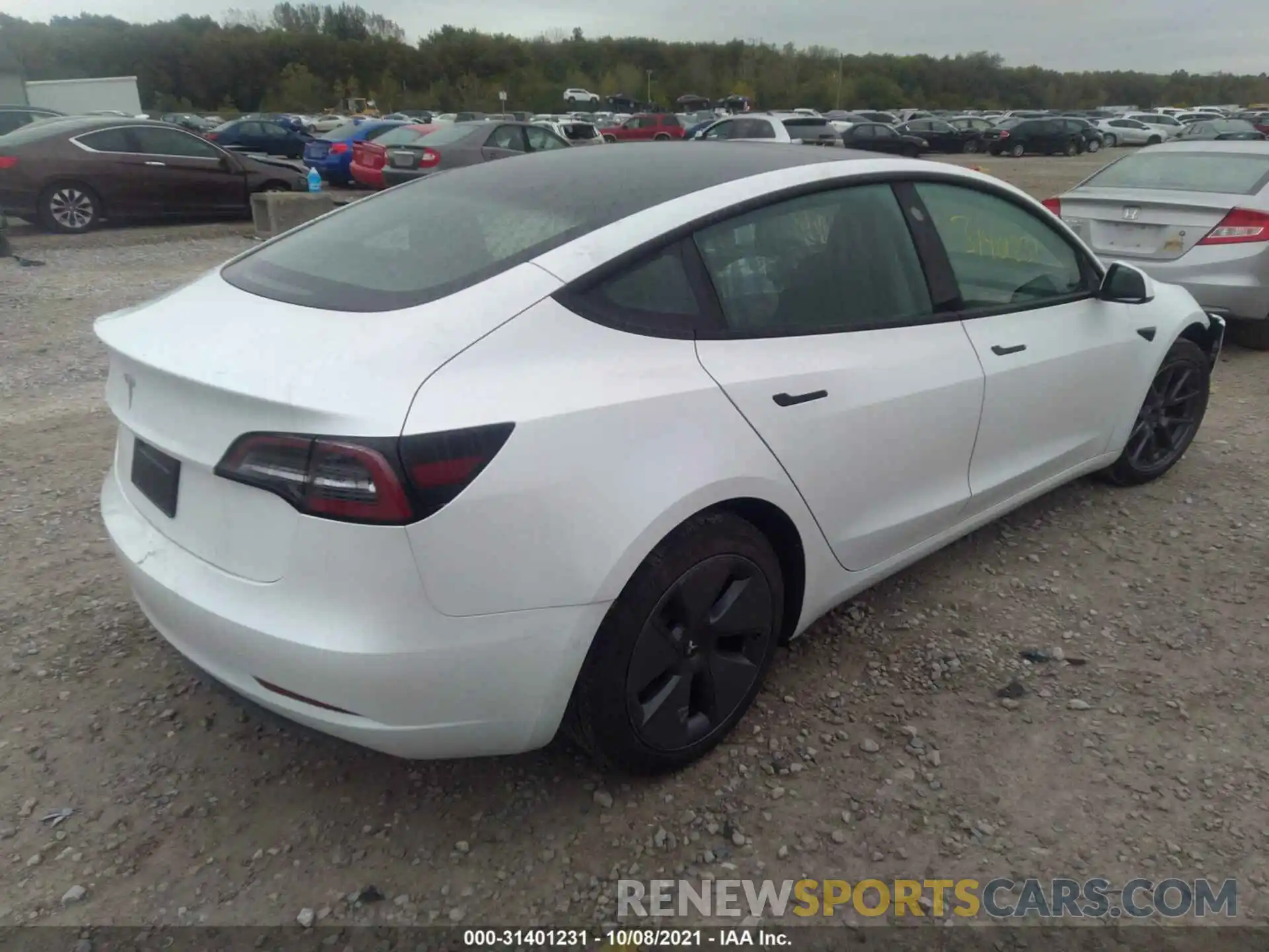 4 Photograph of a damaged car 5YJ3E1EA7MF989105 TESLA MODEL 3 2021