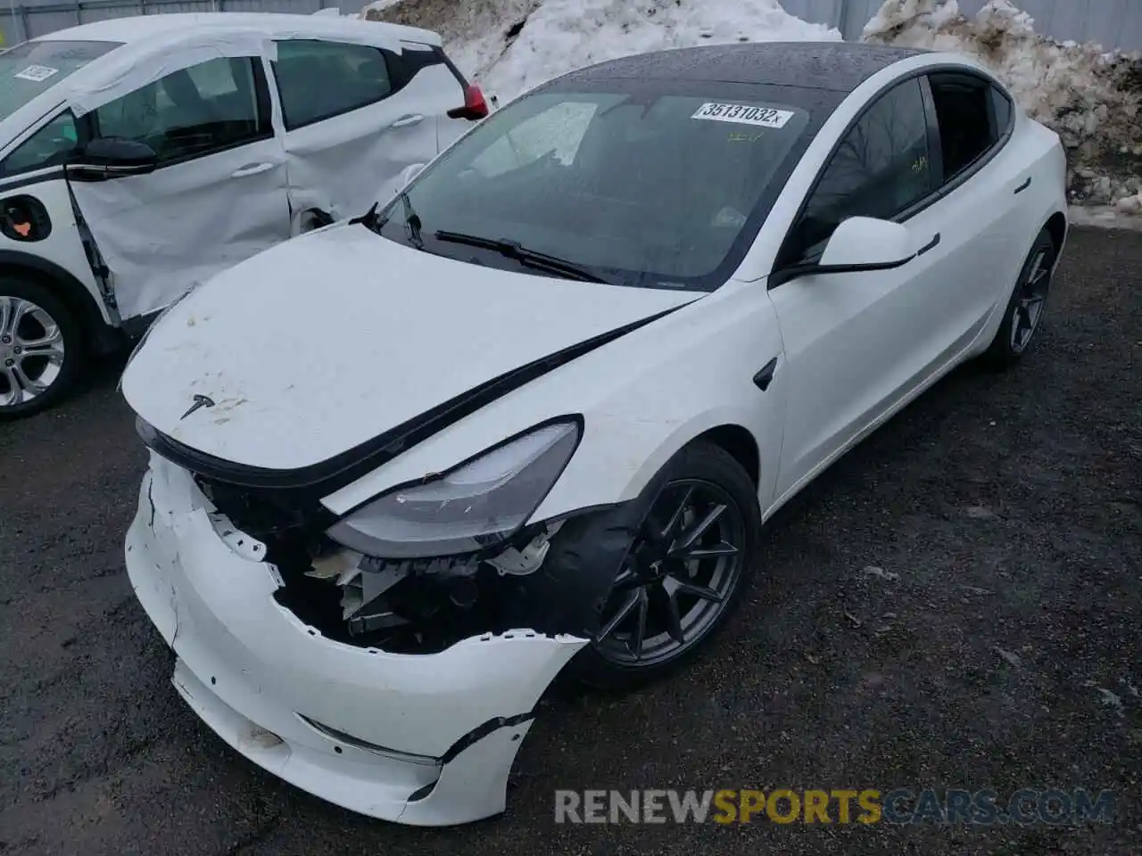 2 Photograph of a damaged car 5YJ3E1EA7MF994580 TESLA MODEL 3 2021