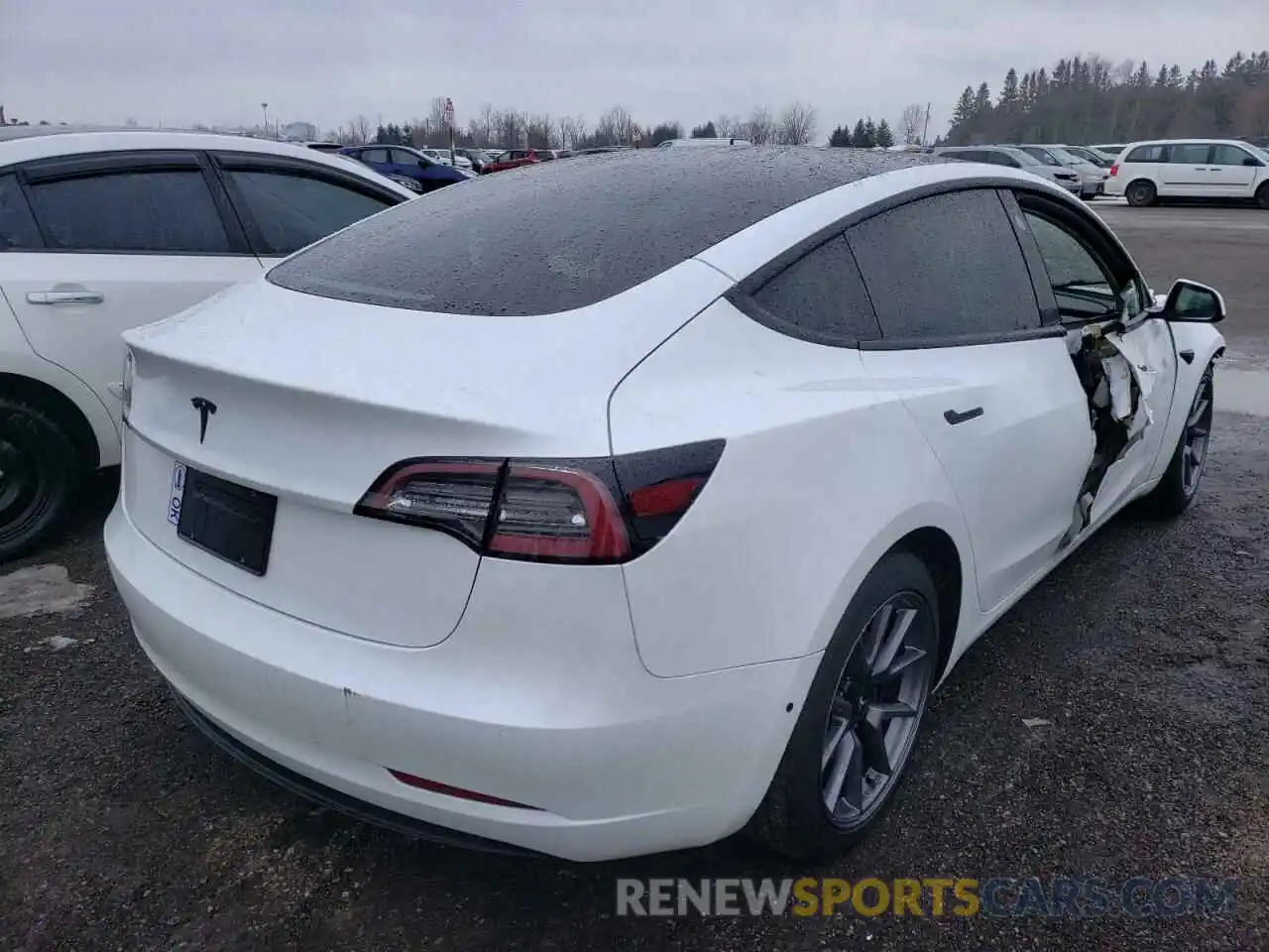 4 Photograph of a damaged car 5YJ3E1EA7MF994580 TESLA MODEL 3 2021