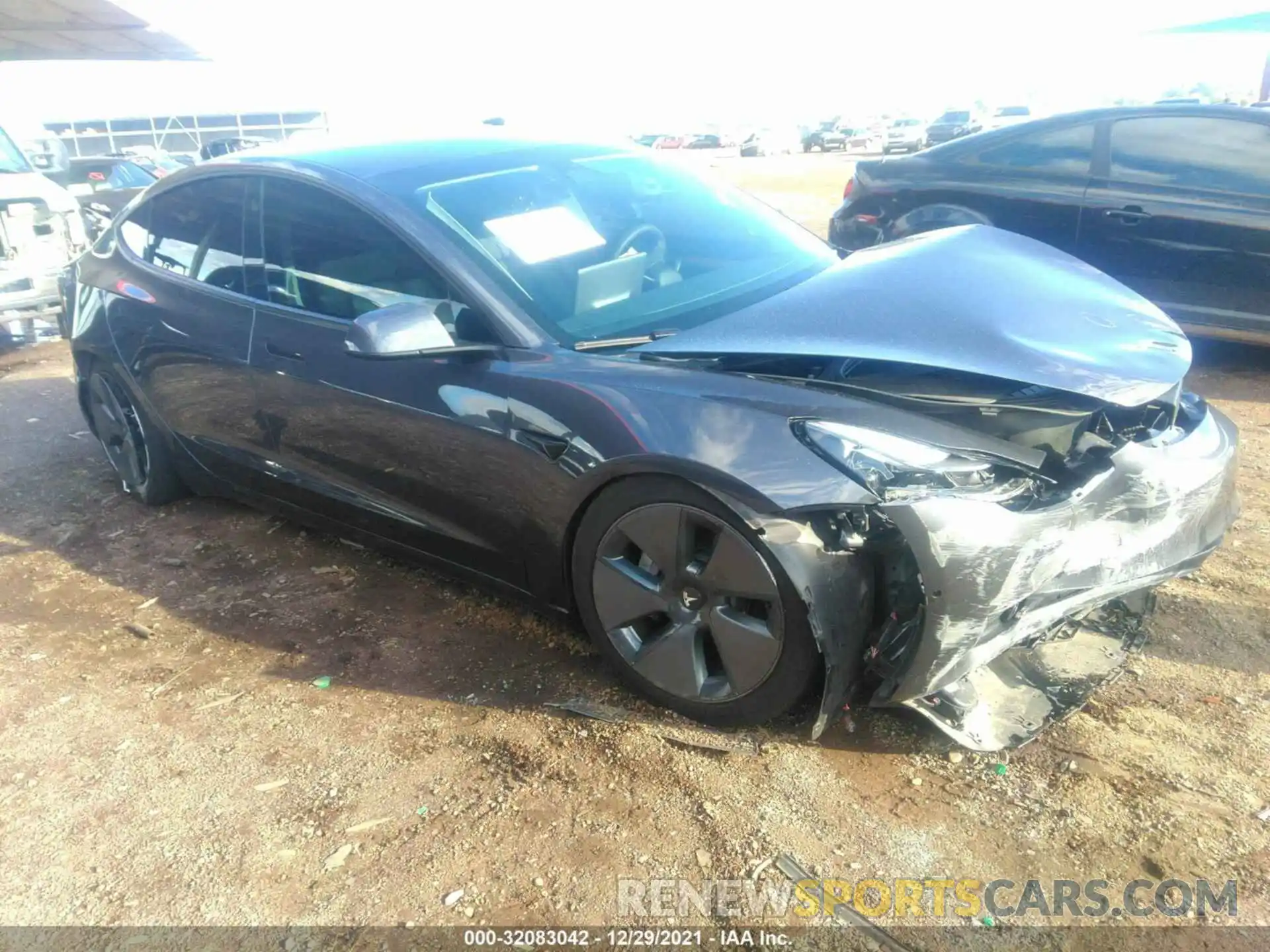 1 Photograph of a damaged car 5YJ3E1EA7MF994692 TESLA MODEL 3 2021