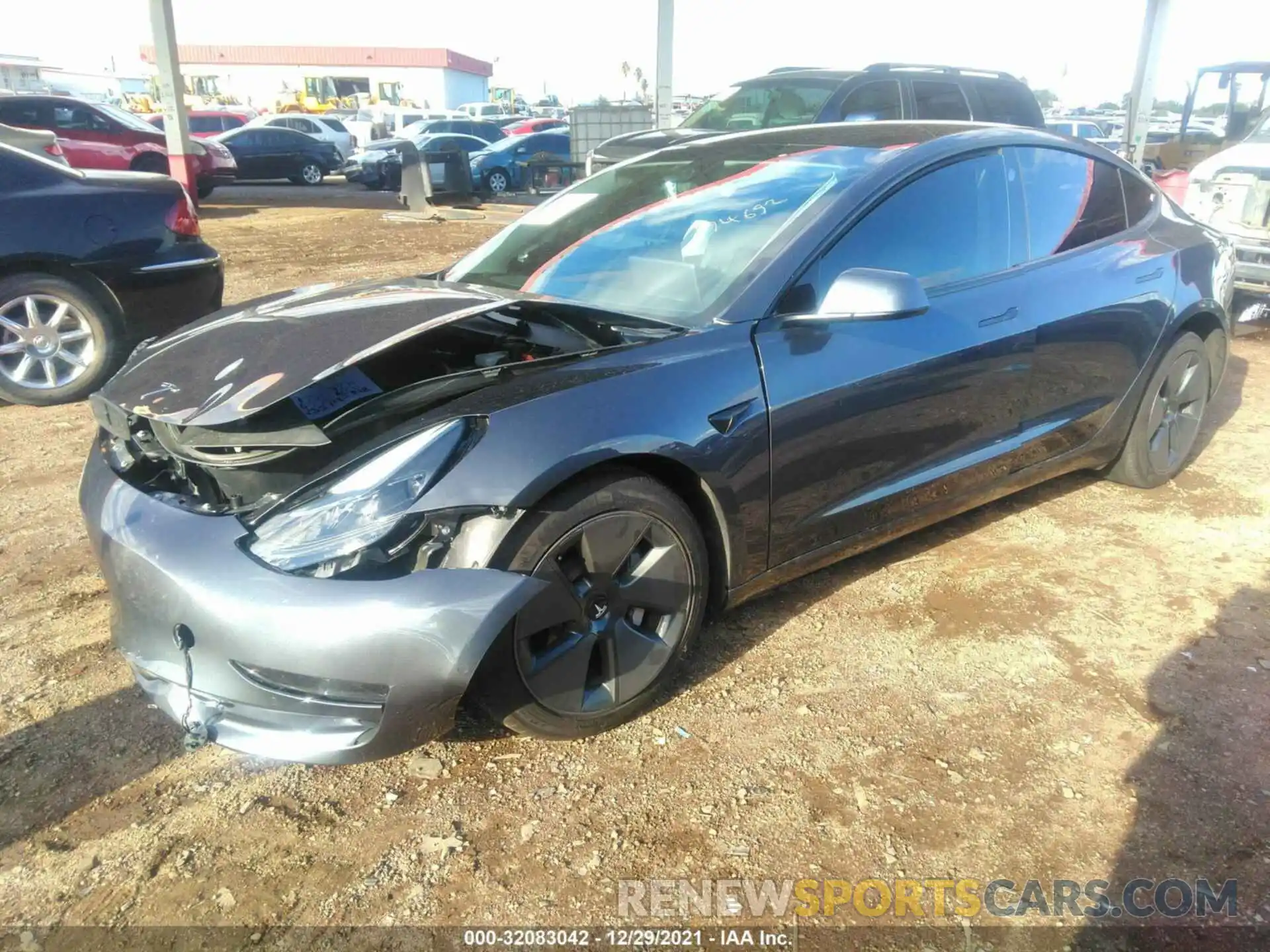 2 Photograph of a damaged car 5YJ3E1EA7MF994692 TESLA MODEL 3 2021