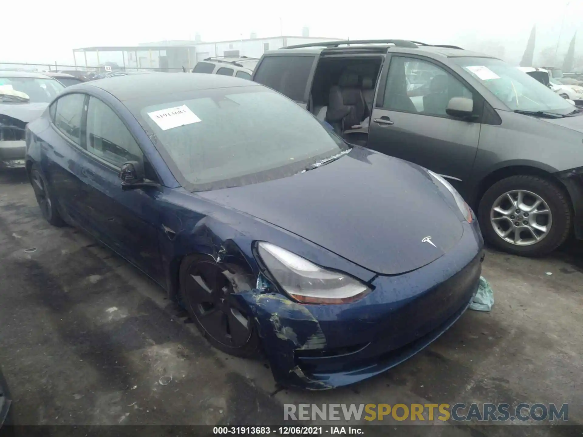 1 Photograph of a damaged car 5YJ3E1EA7MF994773 TESLA MODEL 3 2021