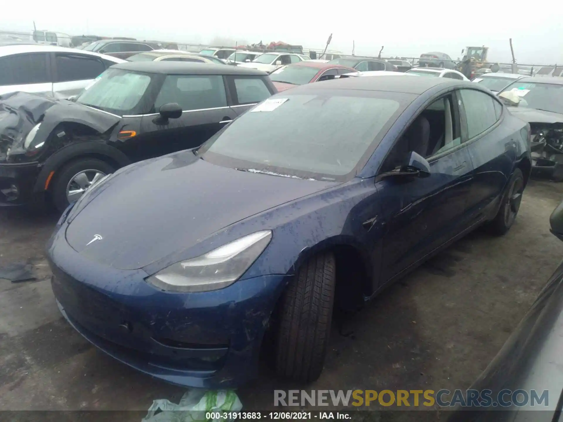 2 Photograph of a damaged car 5YJ3E1EA7MF994773 TESLA MODEL 3 2021