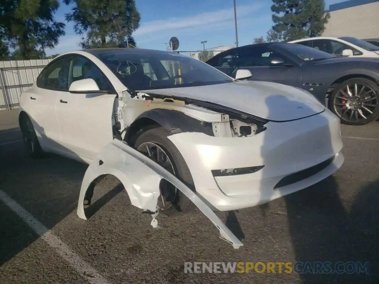 1 Photograph of a damaged car 5YJ3E1EA7MF994787 TESLA MODEL 3 2021