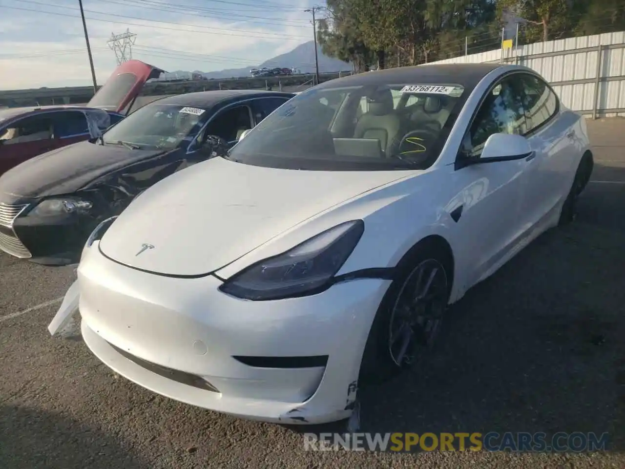 2 Photograph of a damaged car 5YJ3E1EA7MF994787 TESLA MODEL 3 2021