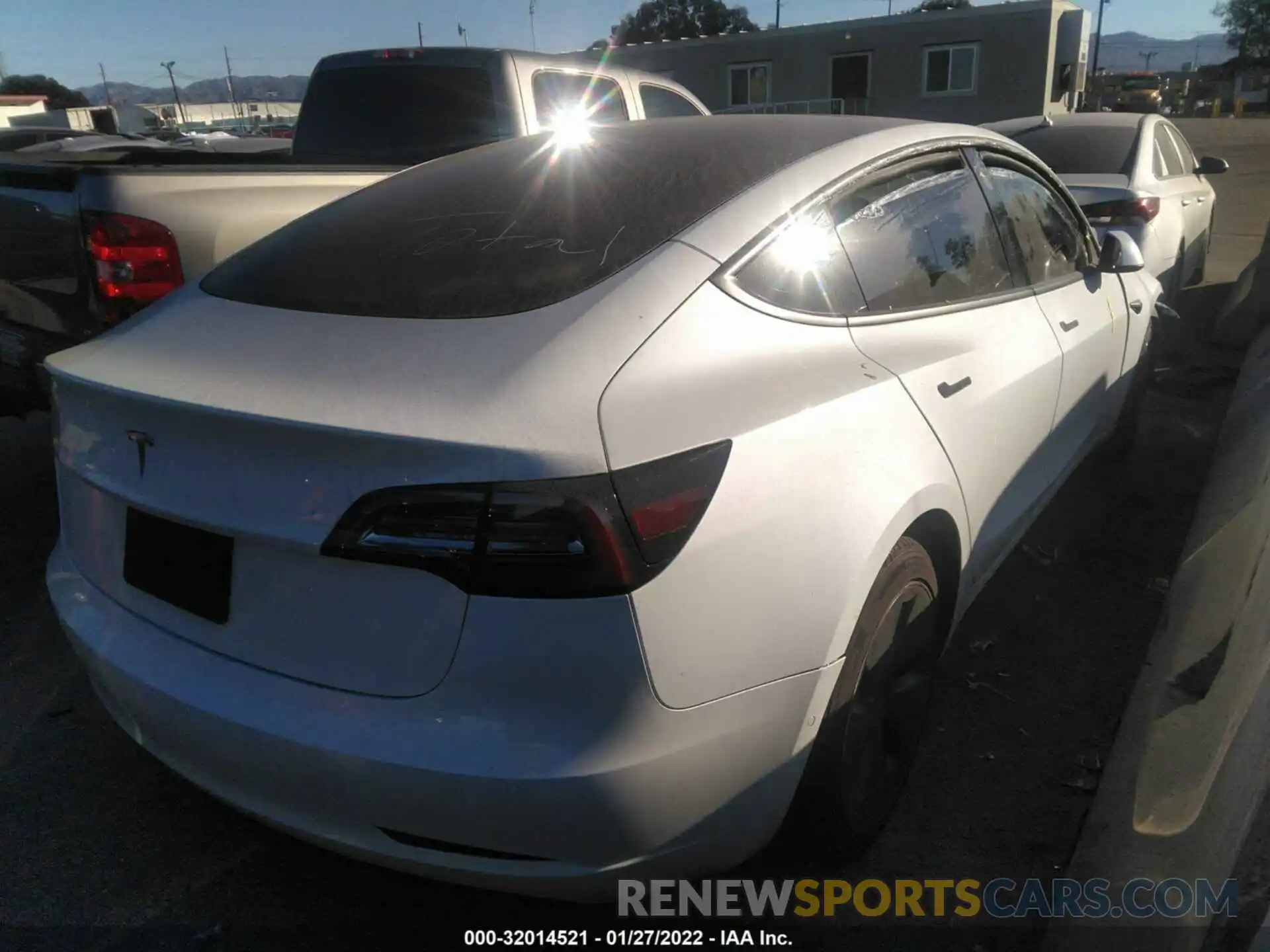 4 Photograph of a damaged car 5YJ3E1EA8MF000700 TESLA MODEL 3 2021