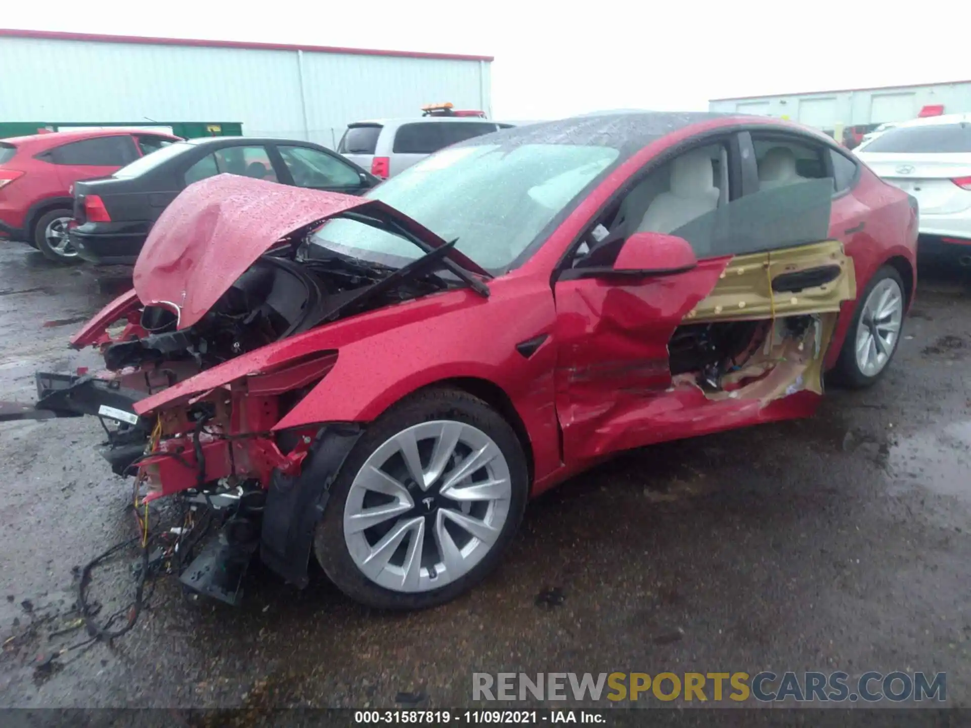 2 Photograph of a damaged car 5YJ3E1EA8MF021000 TESLA MODEL 3 2021