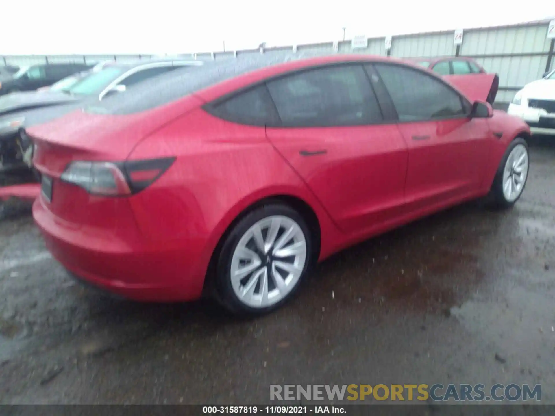 4 Photograph of a damaged car 5YJ3E1EA8MF021000 TESLA MODEL 3 2021