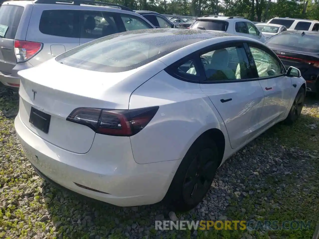 4 Photograph of a damaged car 5YJ3E1EA8MF047242 TESLA MODEL 3 2021