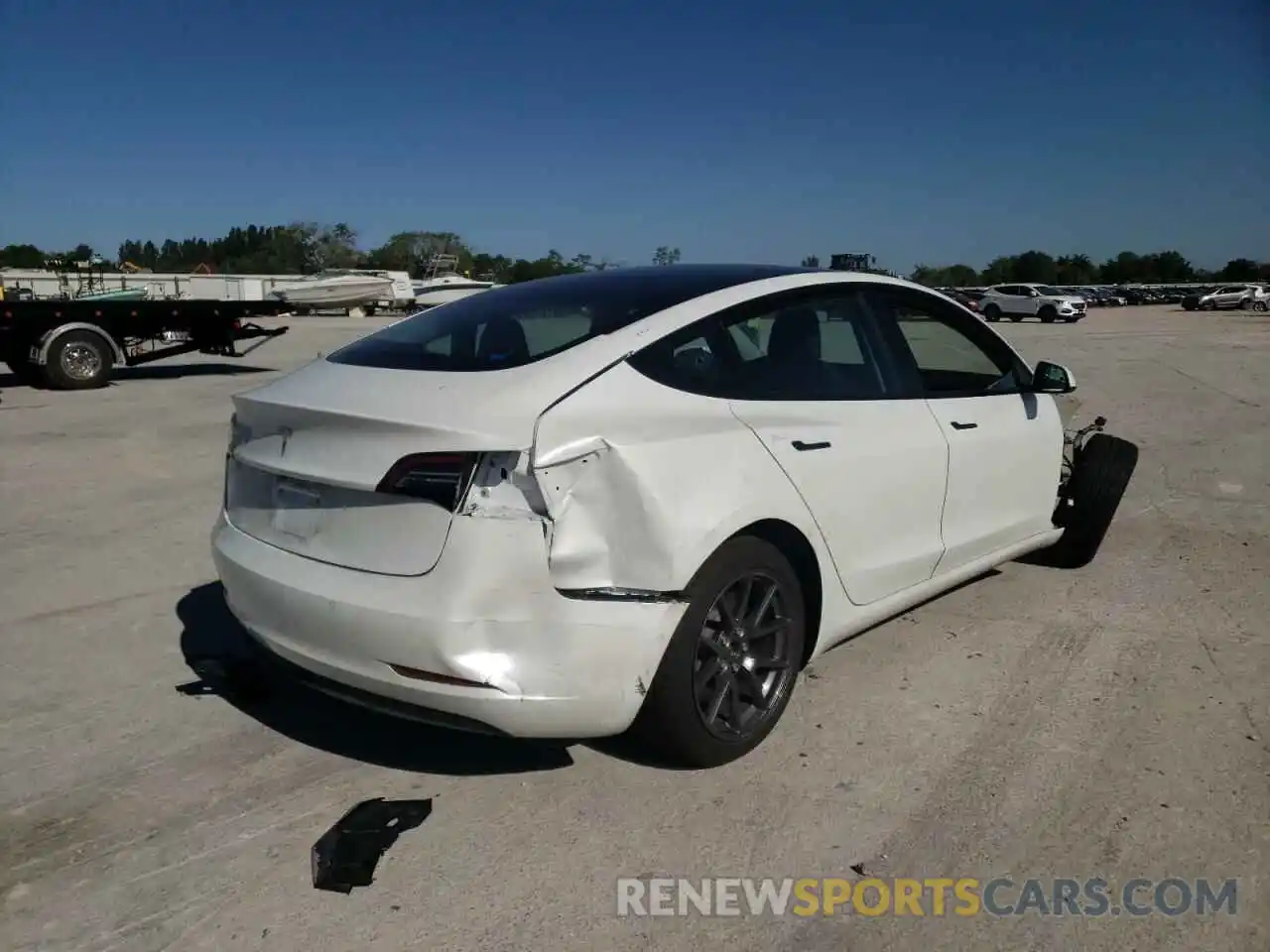 4 Photograph of a damaged car 5YJ3E1EA8MF052277 TESLA MODEL 3 2021