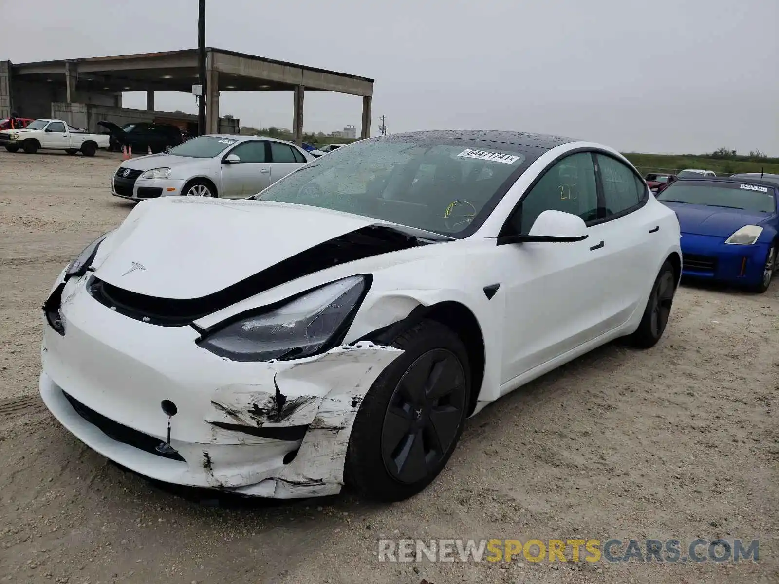 2 Photograph of a damaged car 5YJ3E1EA8MF077793 TESLA MODEL 3 2021