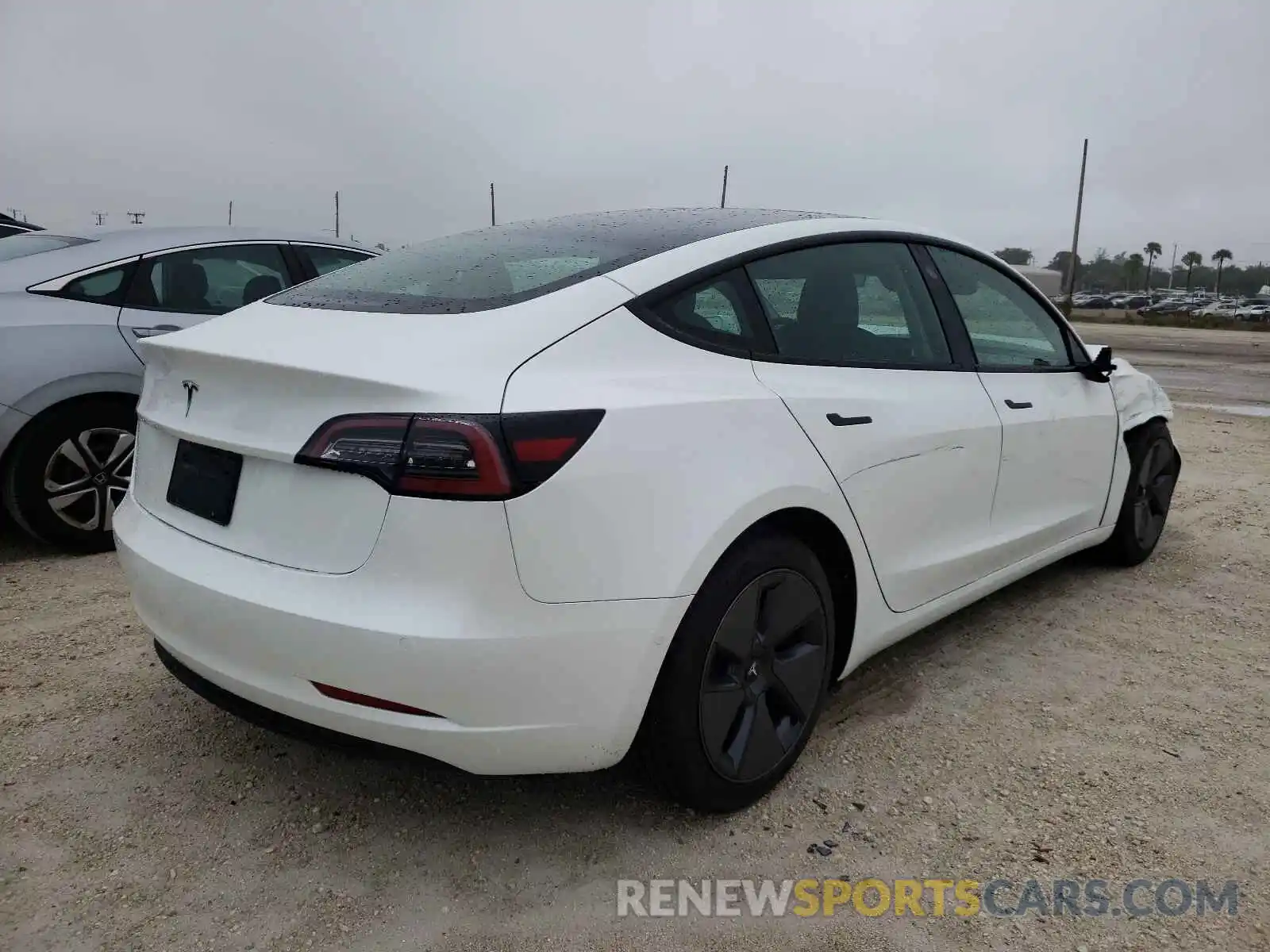 4 Photograph of a damaged car 5YJ3E1EA8MF077793 TESLA MODEL 3 2021